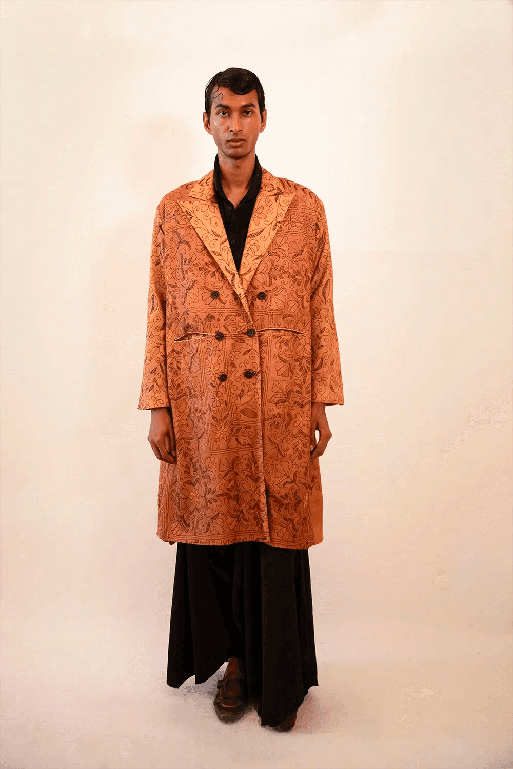 Ved is our one-of-a-kind double-breasted silk trench coat, handcrafted by skilled artisans in-house using a vintage silk sari. 