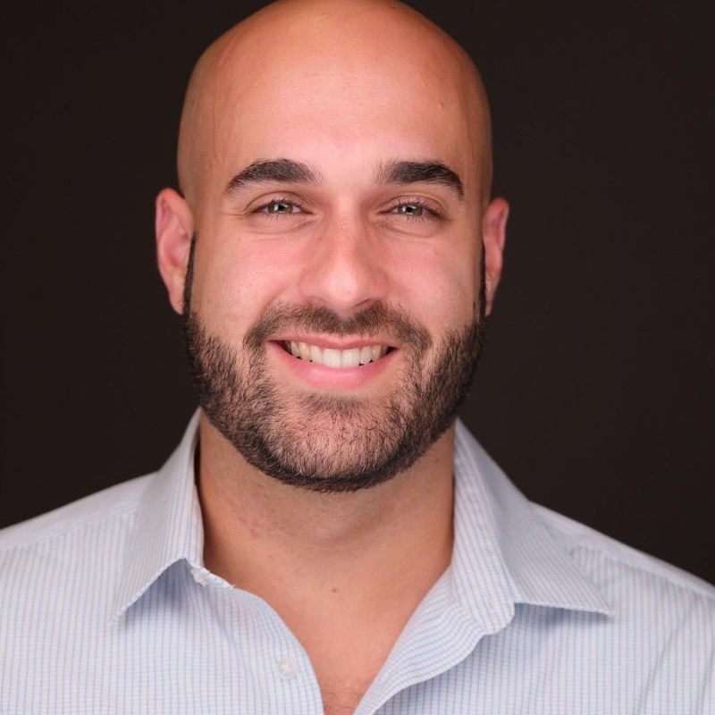 a person with a grey sweater