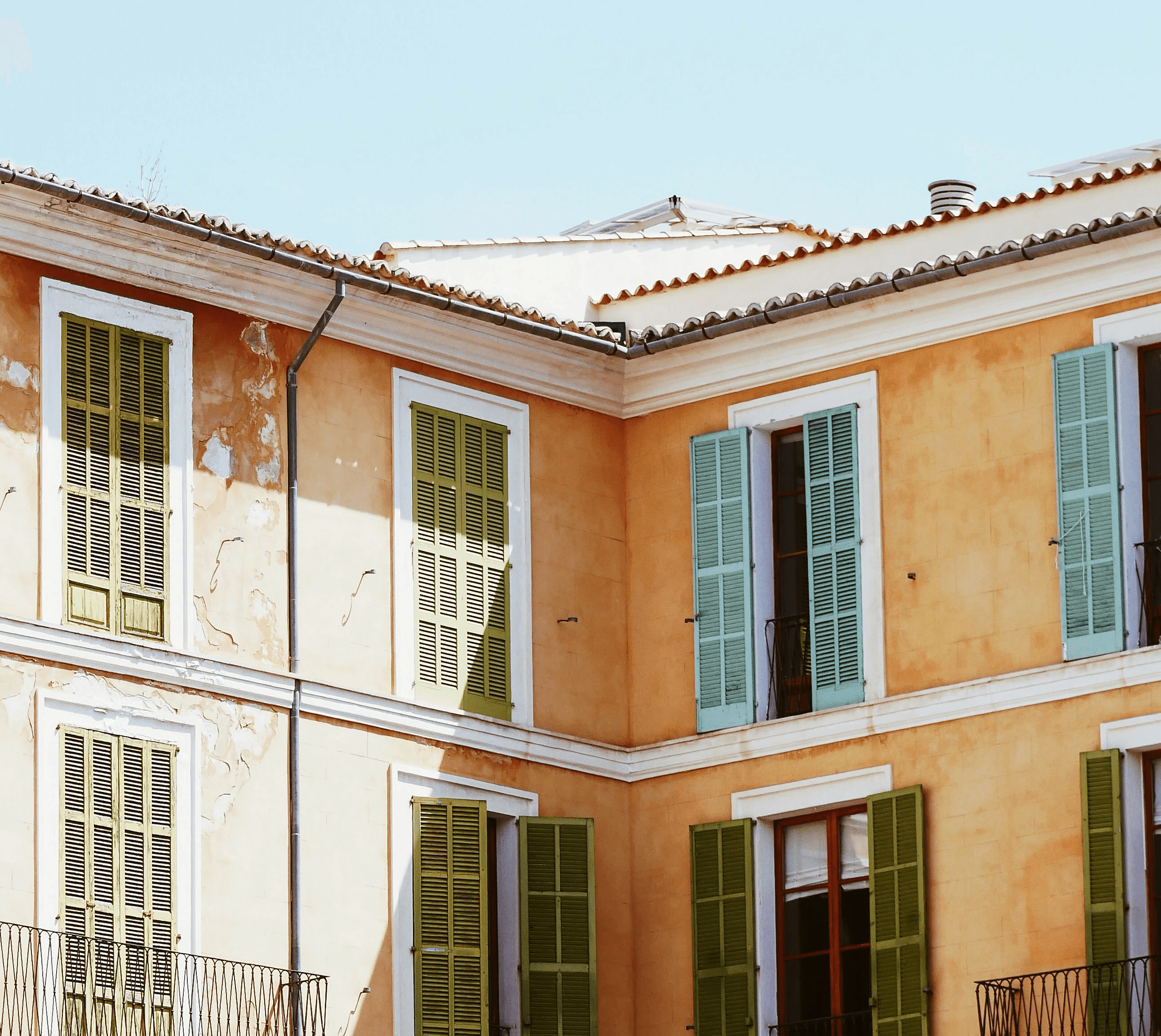 brown and white 4-story building