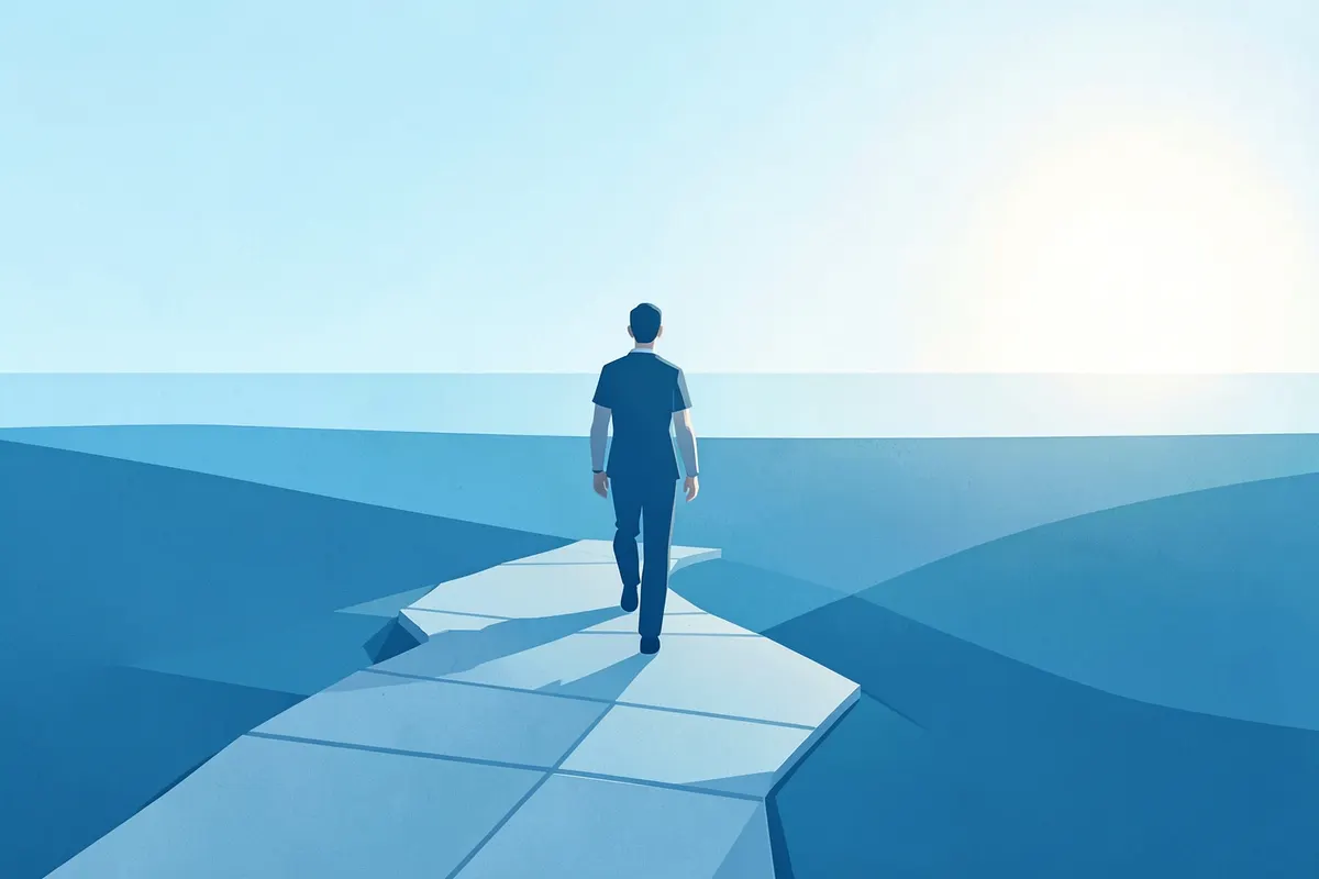Person walking up a path towards a bright horizon.