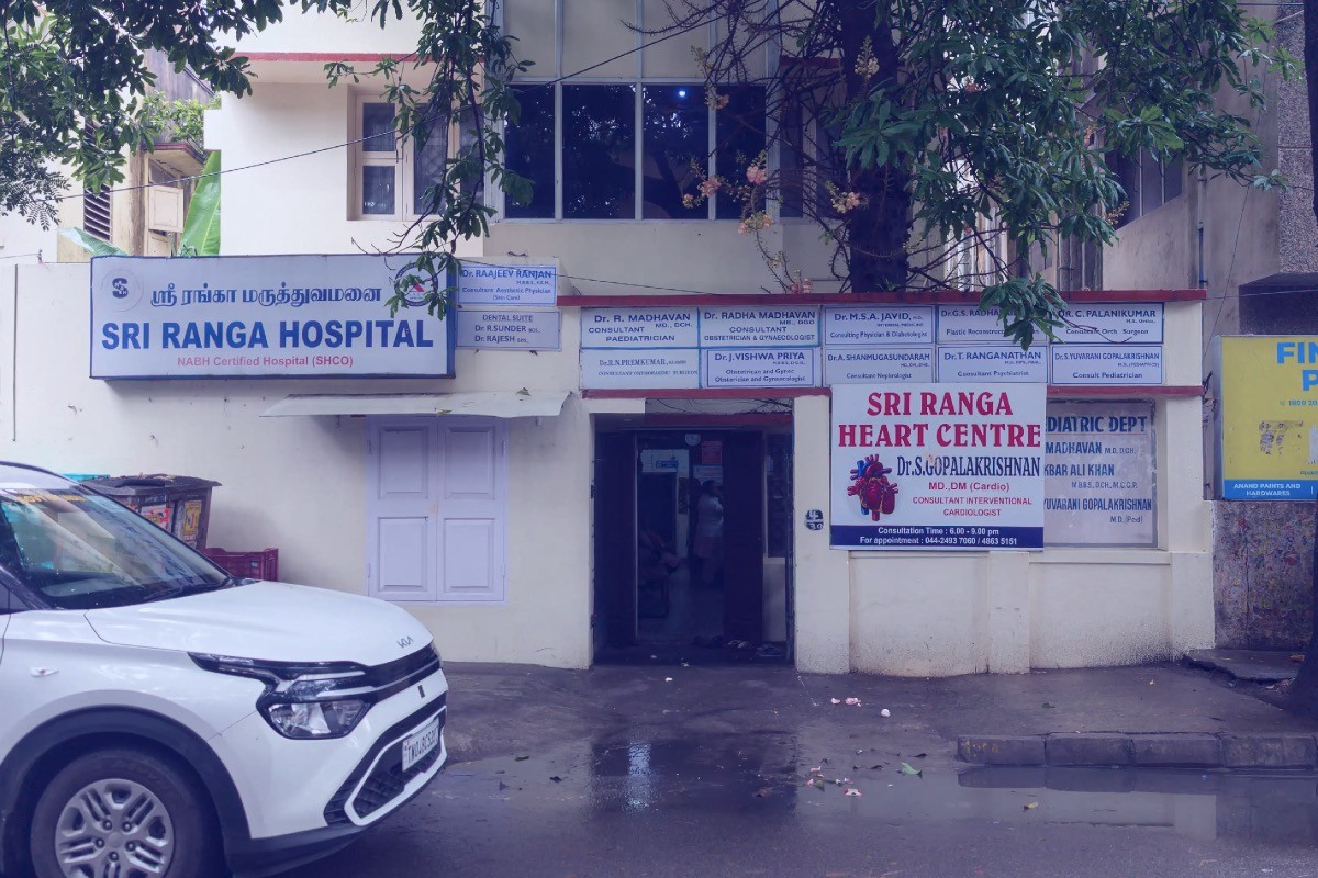 This is the cream color two floor outpatient block of sri ranga hospital where general medicine, orthopedics, pediatrics, laboratory, neuro psychiatry, xray are consulted