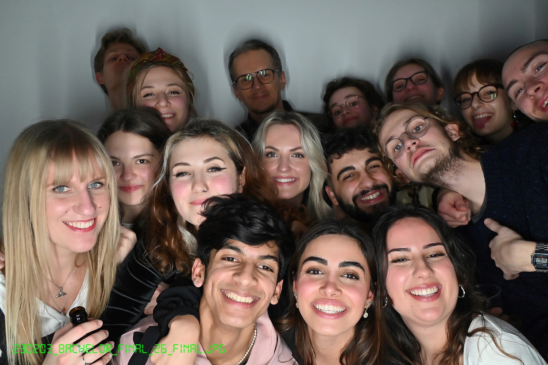 Person sitting on a ledge overlooking New York City skyline