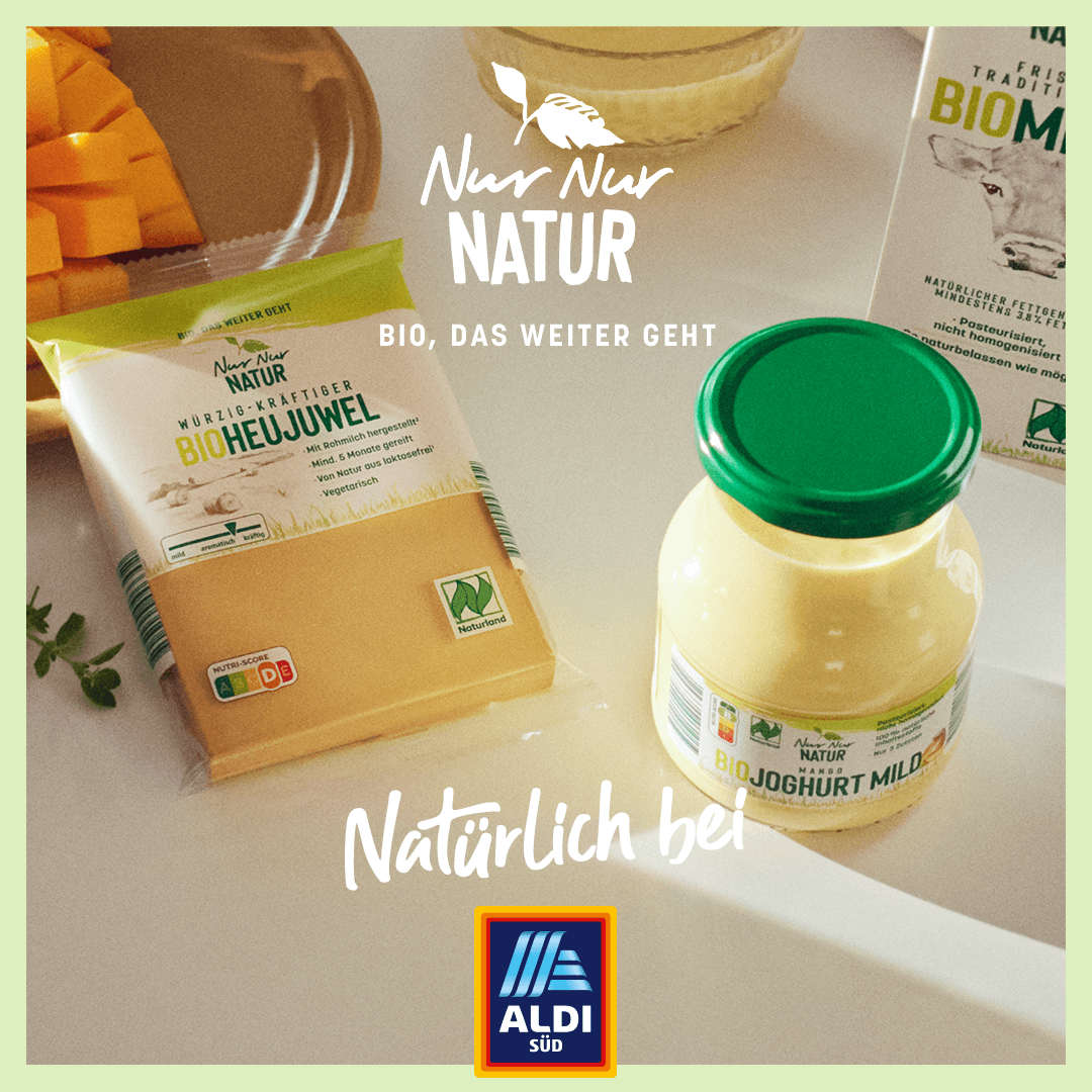 Editorial product photography featuring Nur Nur Natur organic dairy products in a warm natural-light setting.