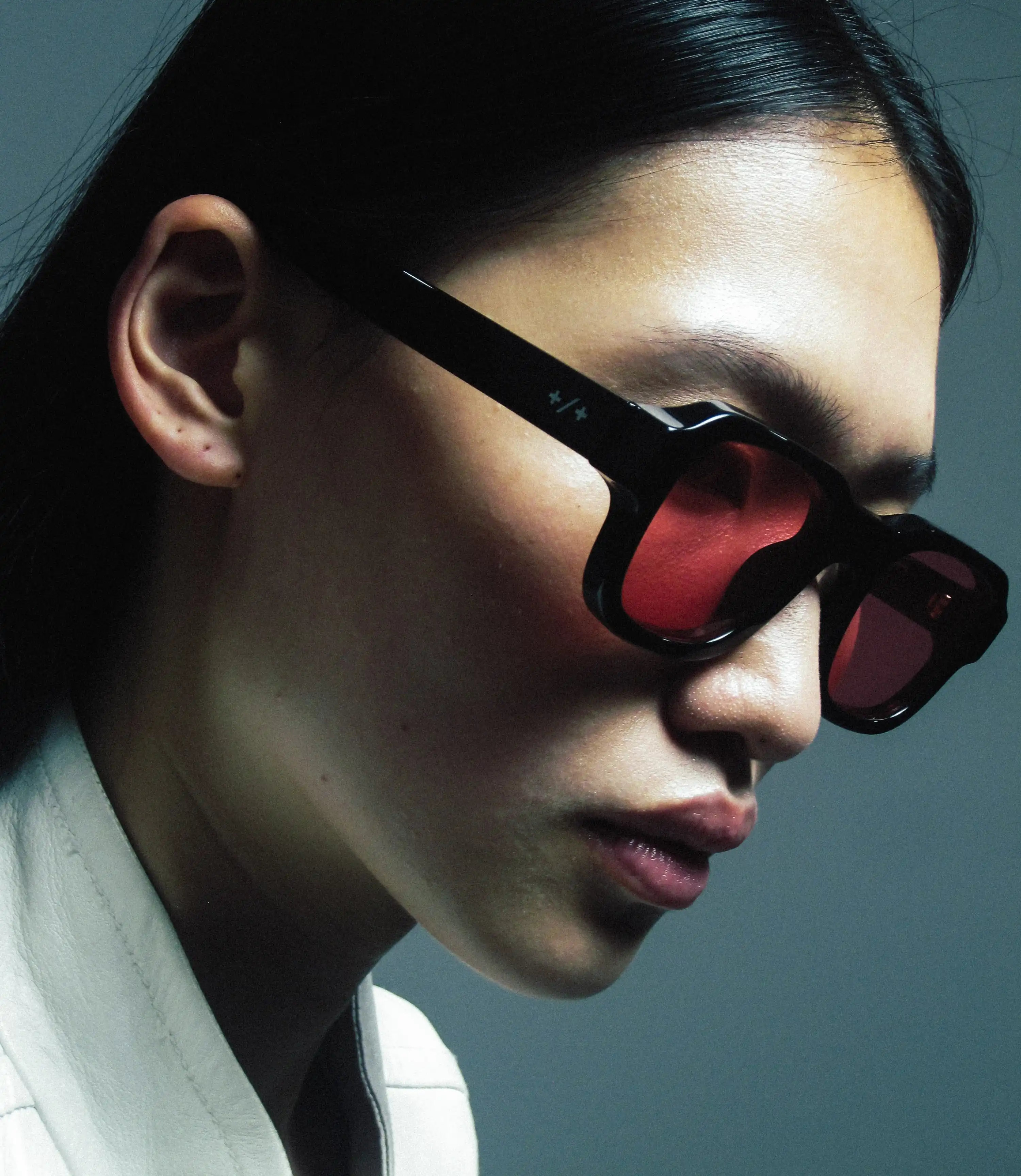 Minimalist book cover on white stairs with clean editorial design