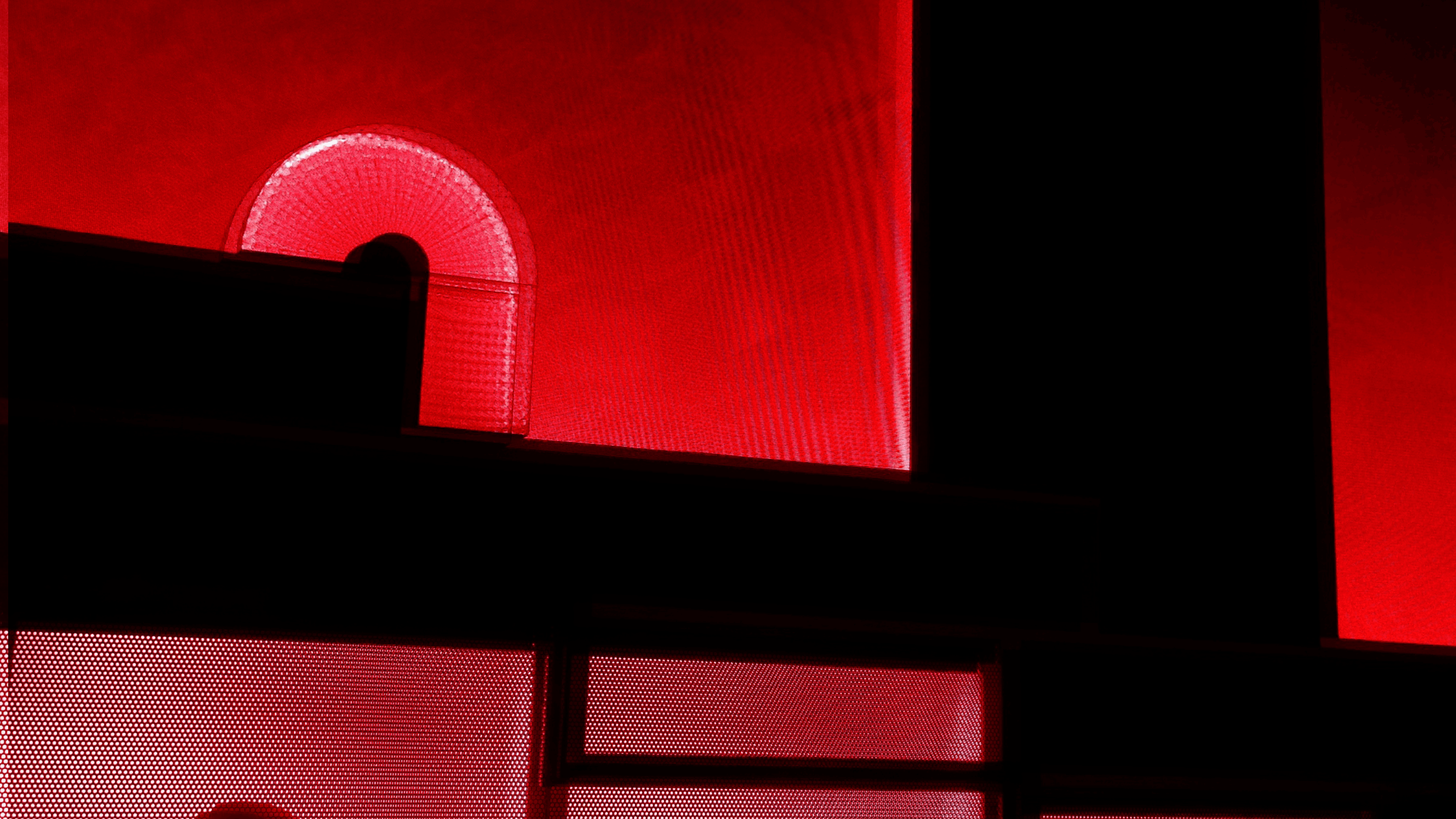 Artistic portrait with red and blue lighting creating a dramatic effect