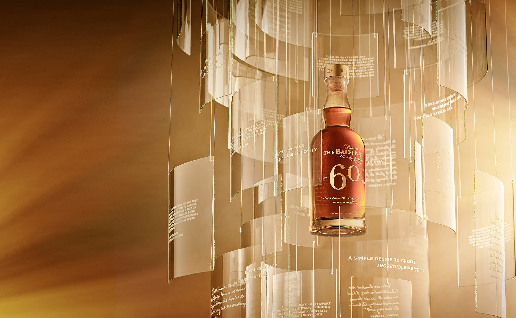 A whiskey bottle suspended within a glass structure with a warm amber background, surrounded by transparent panels creating a serene ambiance.