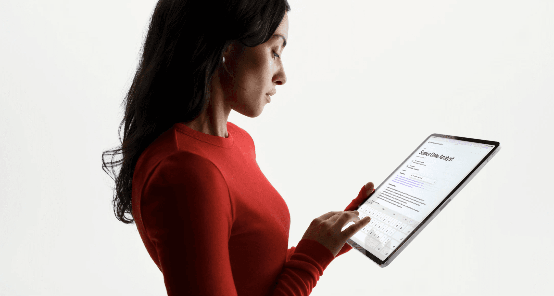 Woman typing on a digital tablet - Best AI Agents for Excel