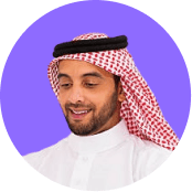 A man in traditional attire smiles against a purple background, framed in a circular image.