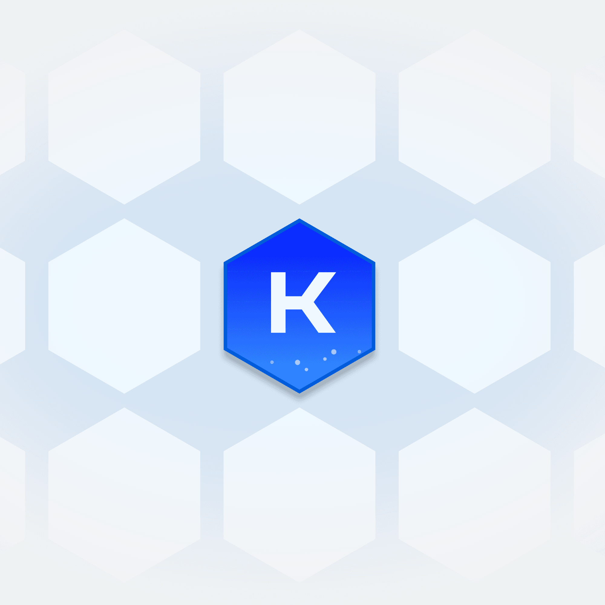 Woman with curly hair wearing yellow sunglasses and a large silver chain.