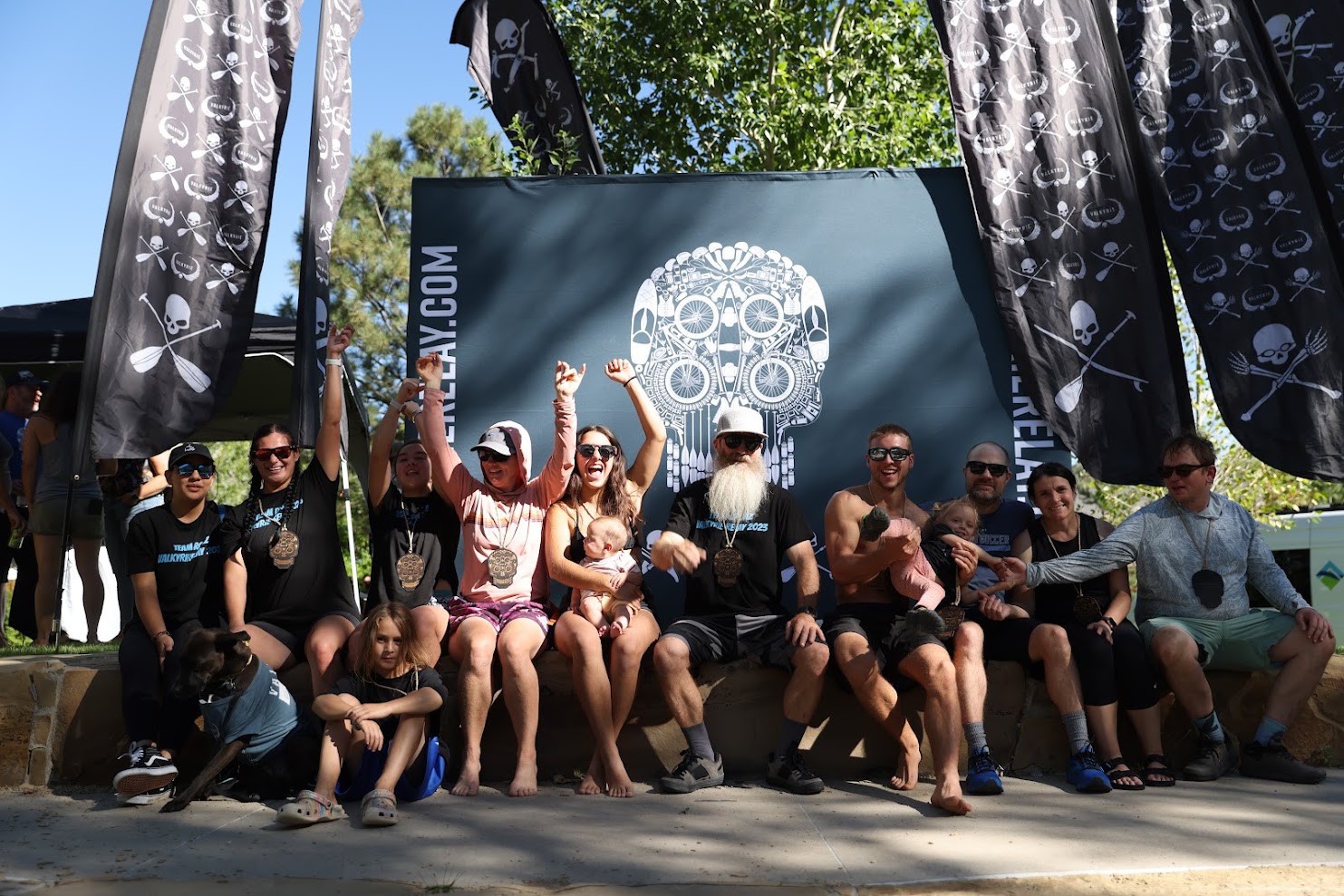 Teams celebrating under Valkyrie flags