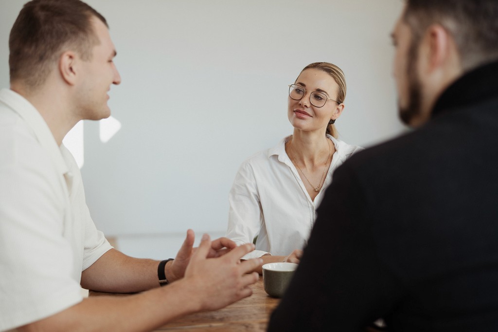 Group of founders in a StoryOS workshop discussing brand narrative systems