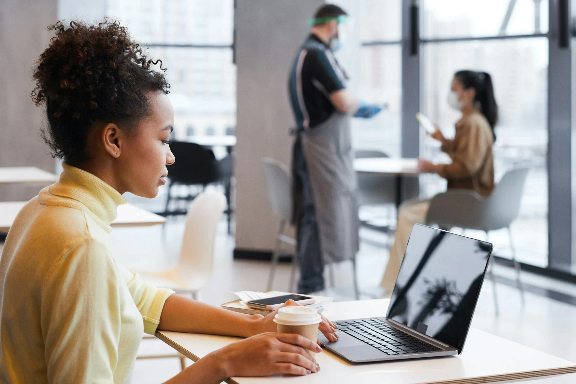 Female employee managing something on the computer