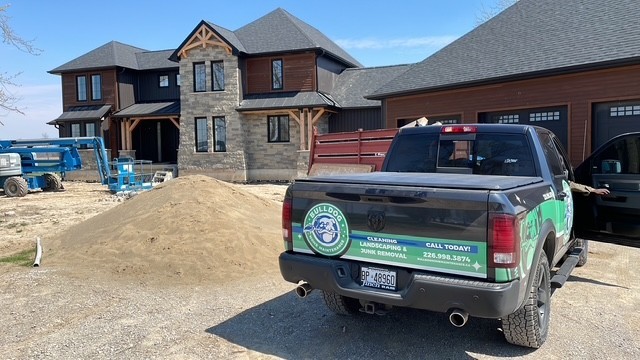 red and black ride on toy car on snow covered ground