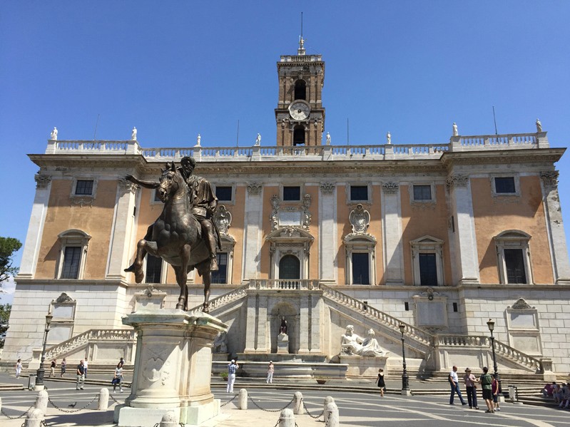 old square with sculpture of man on horse