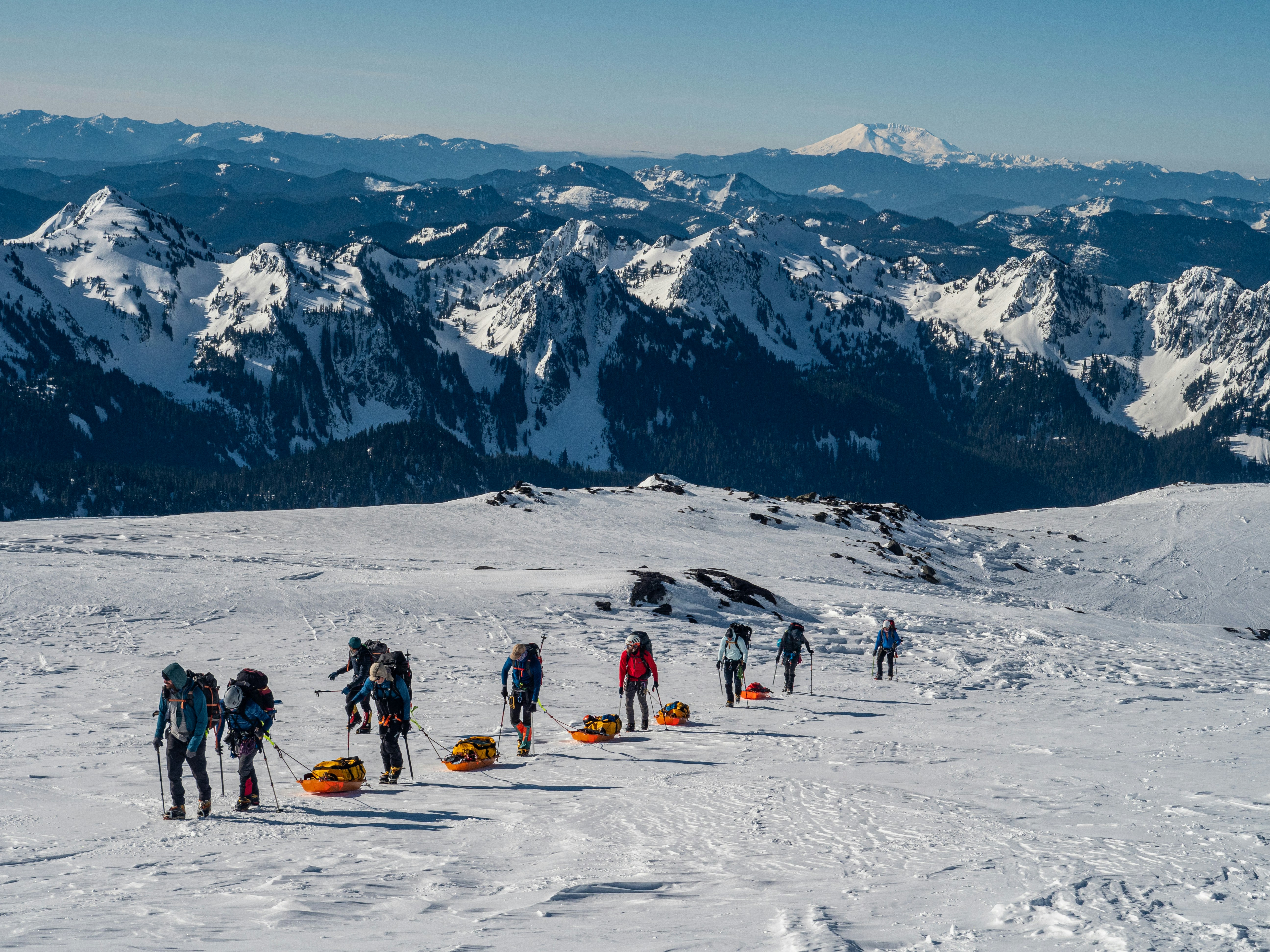 people on snow covered mountain during daytime