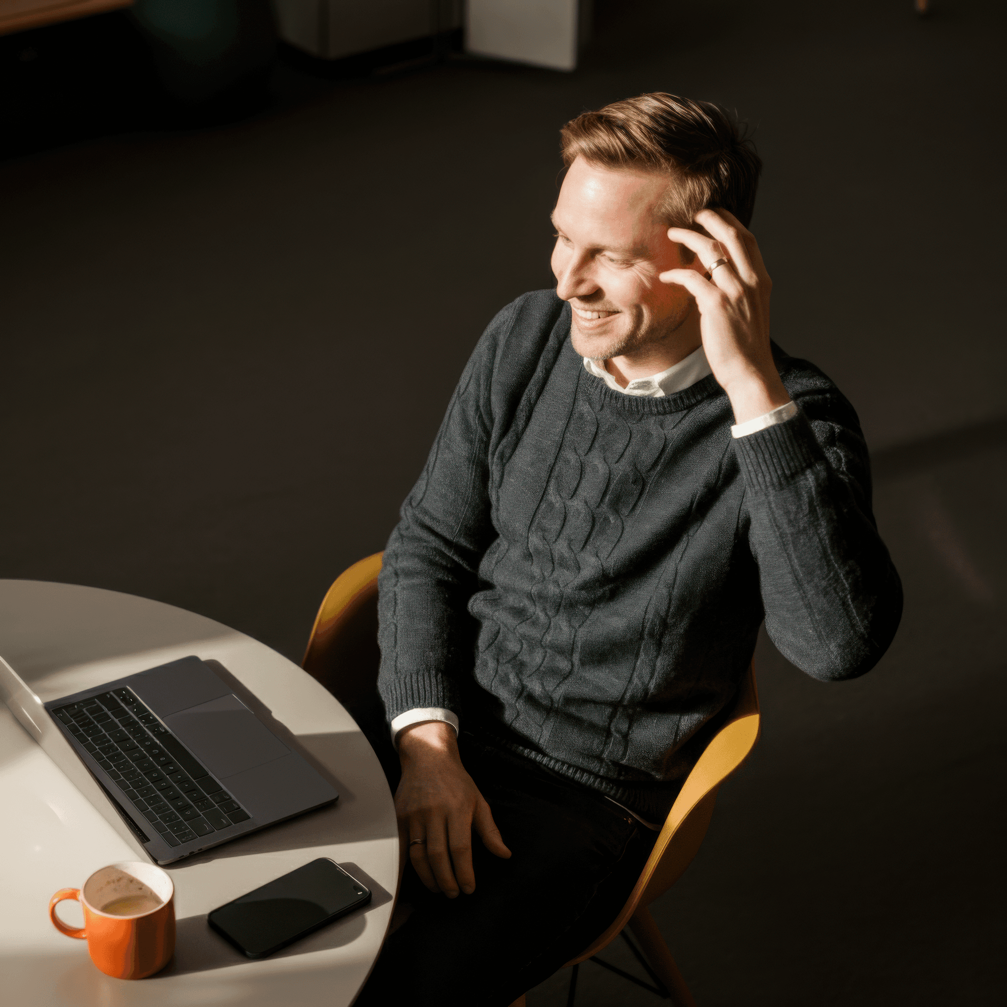 Man sitting by desk