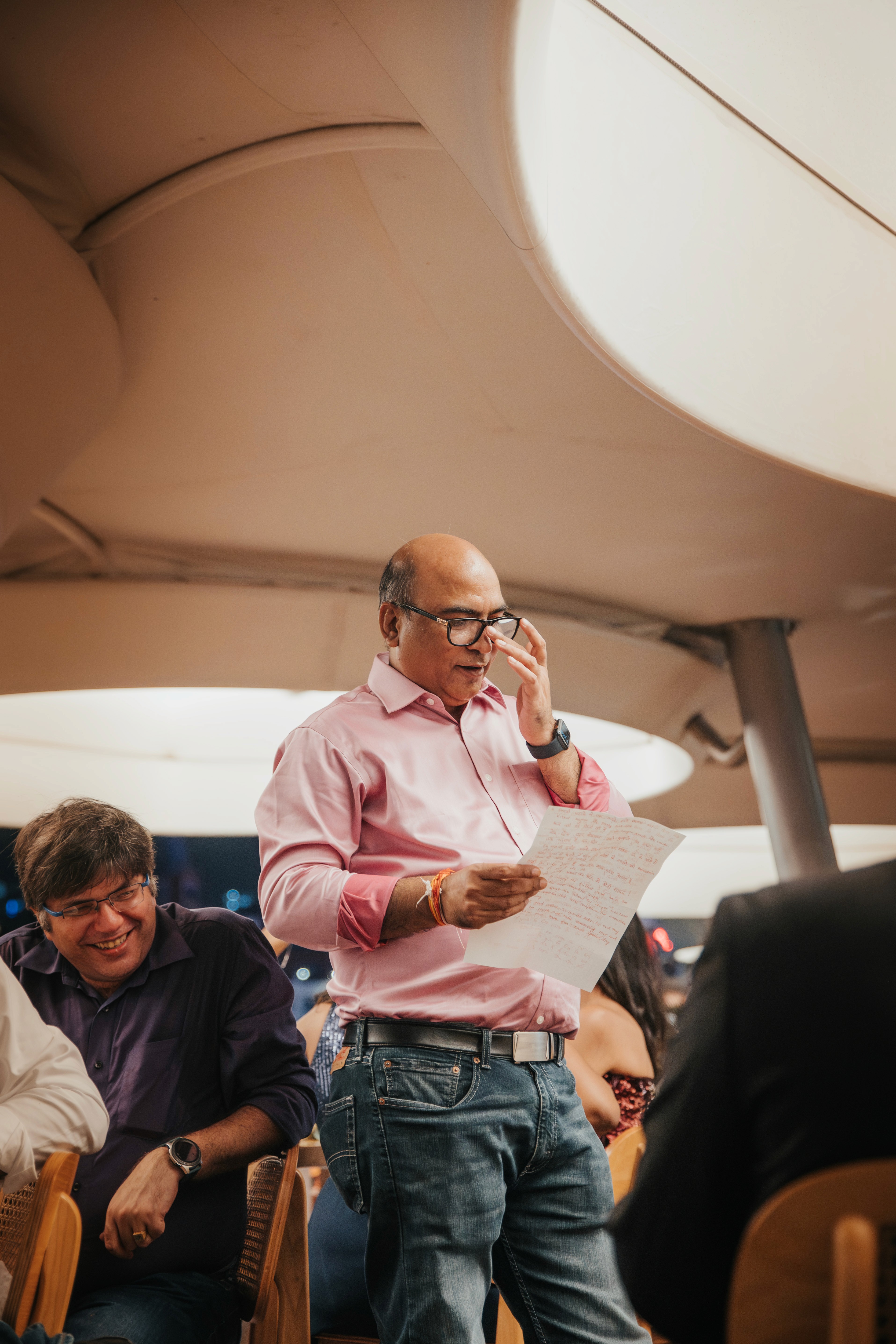 A family member delivering a toast to the couple during the dinner service at the Clarke Quay venue.