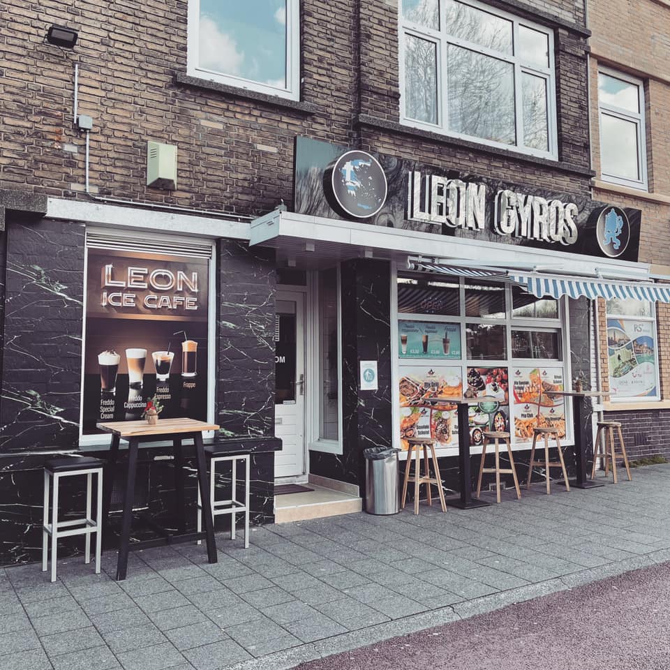man standing front of plate with vegetable