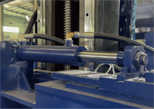 Detailed view of the hydraulic tensioning system on the Intelligent Block Squaring Wire Saw Machine, highlighting the precise control it offers during the cutting process.