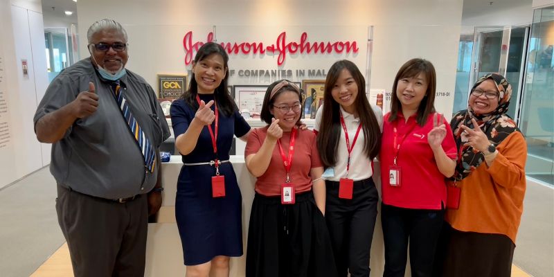 Lovy and her previous colleagues at her pharmacy job in Johnson & Johnson
