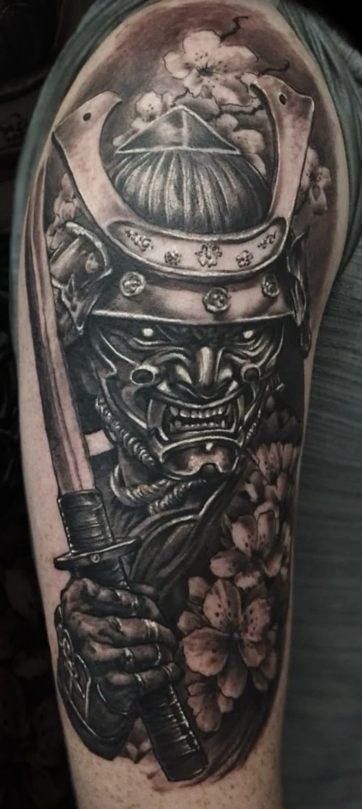 Samurai upper-arm tattoo by Tomski