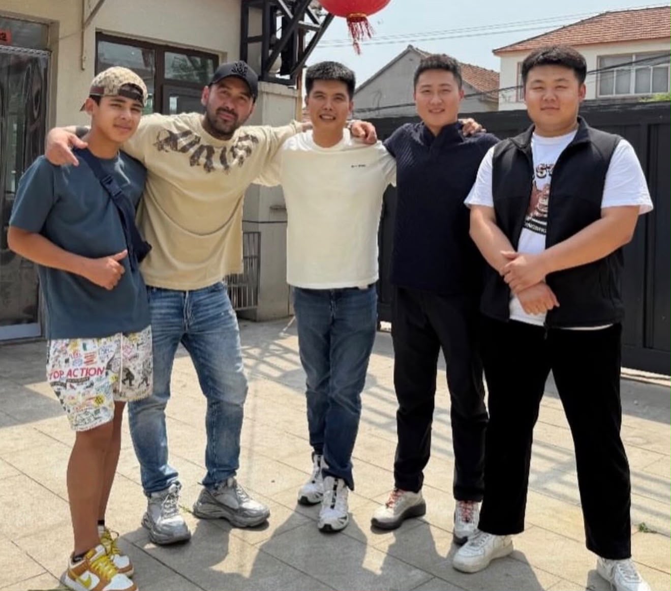The Exotics & Bullies Kennel team during a visit to breeders in China