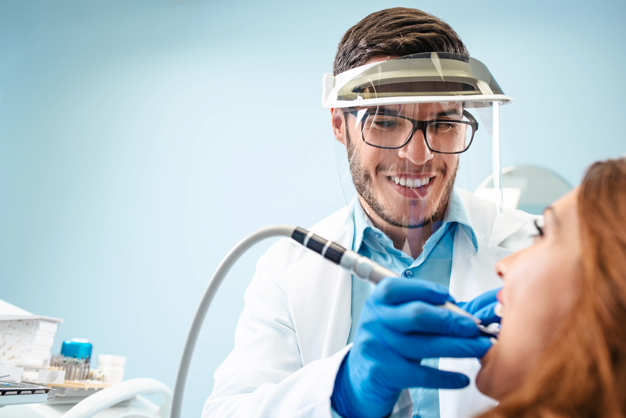 Dentist examining a patient in a modern dental clinic