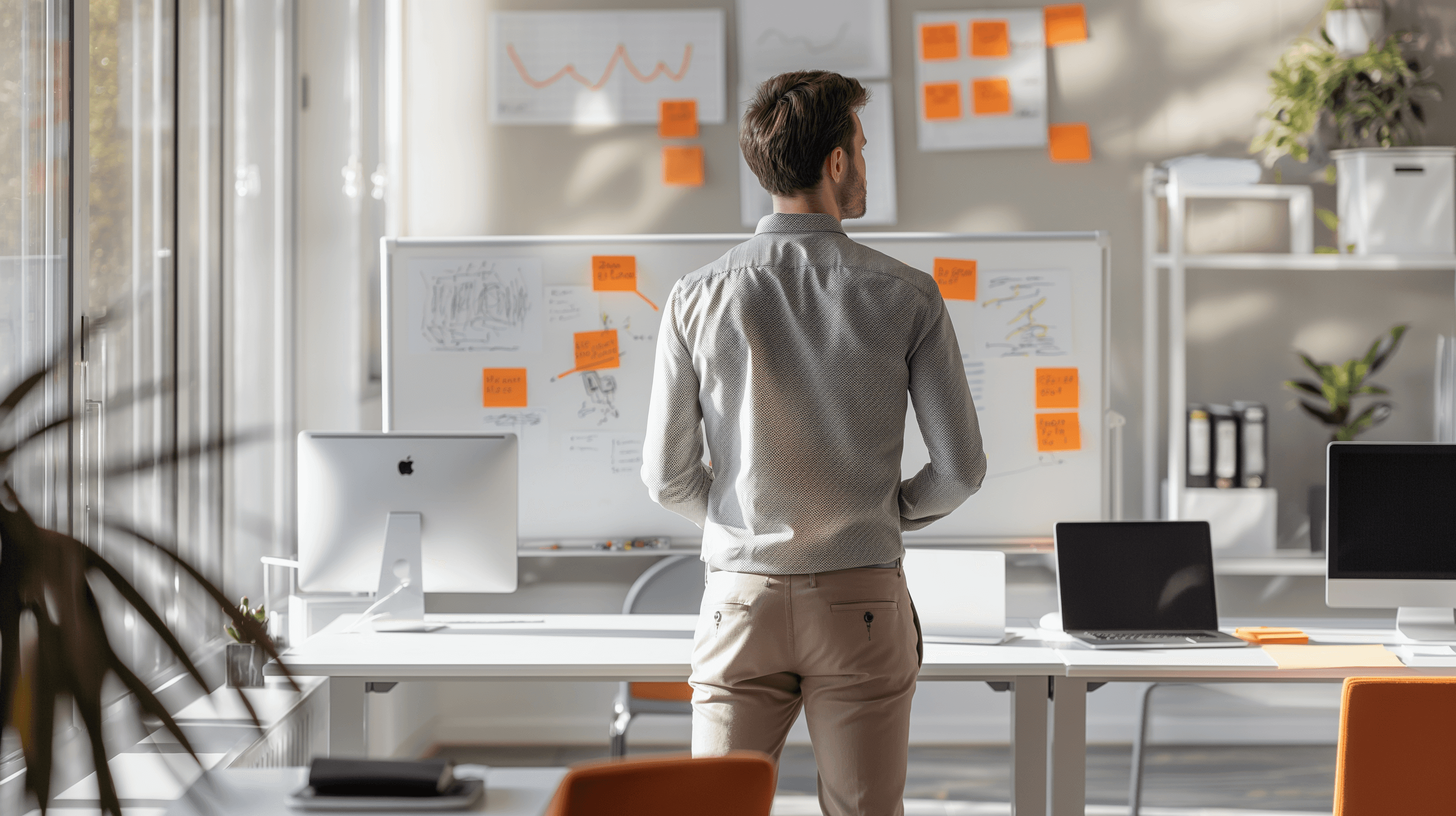 A man standing with Sufboard