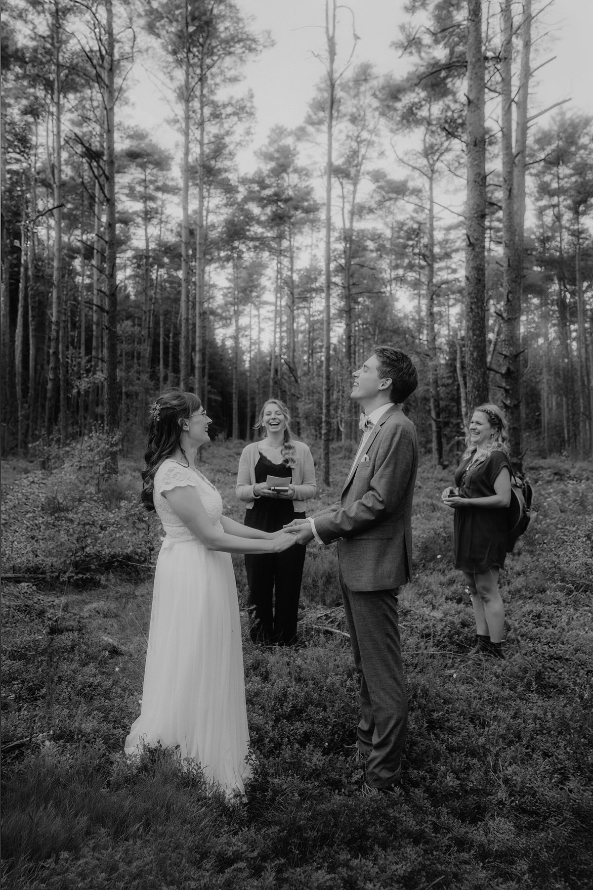 elopement ceremony in swedish forest with a few guests