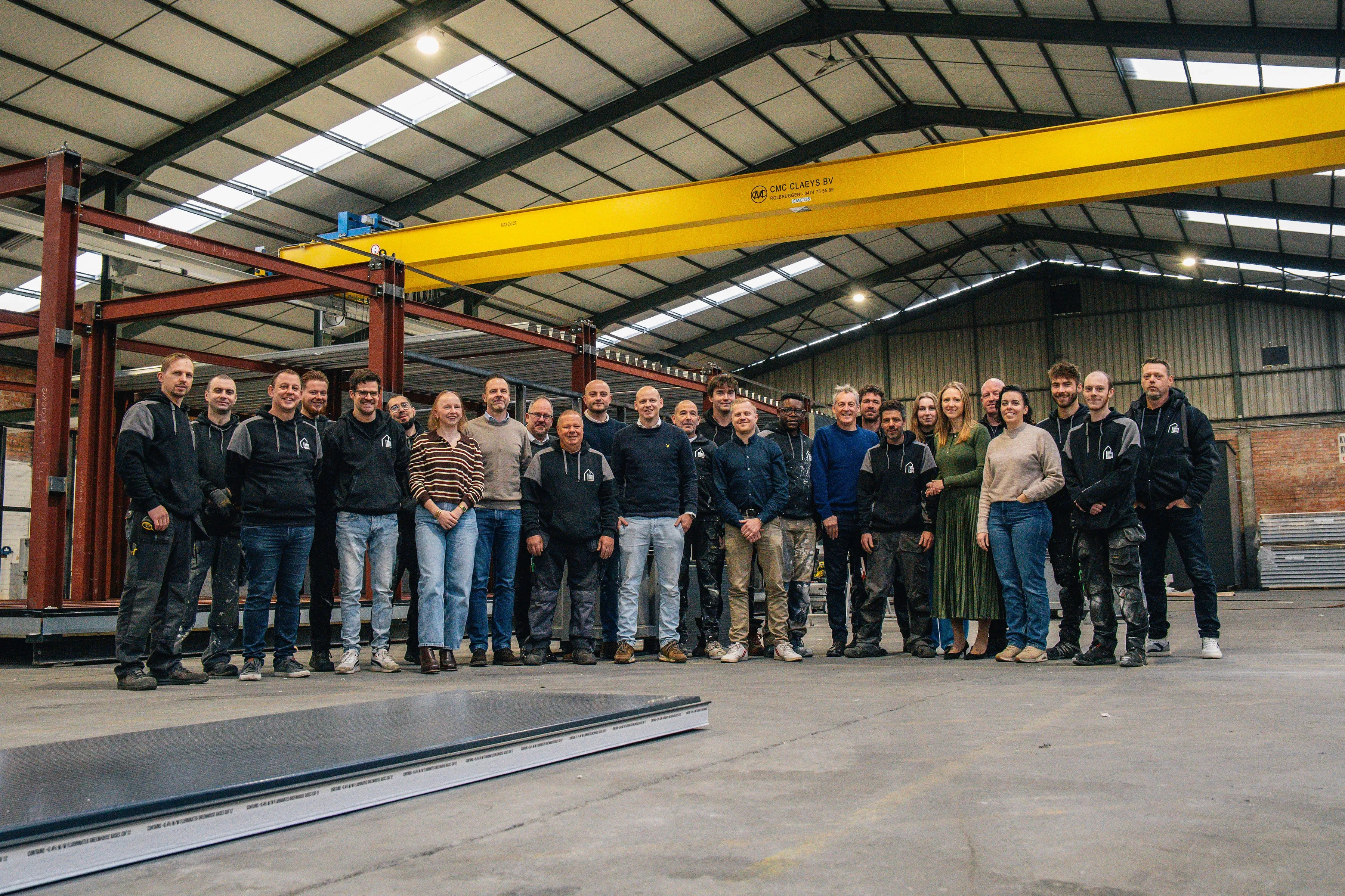 Teamfoto van medewerkers Hubley