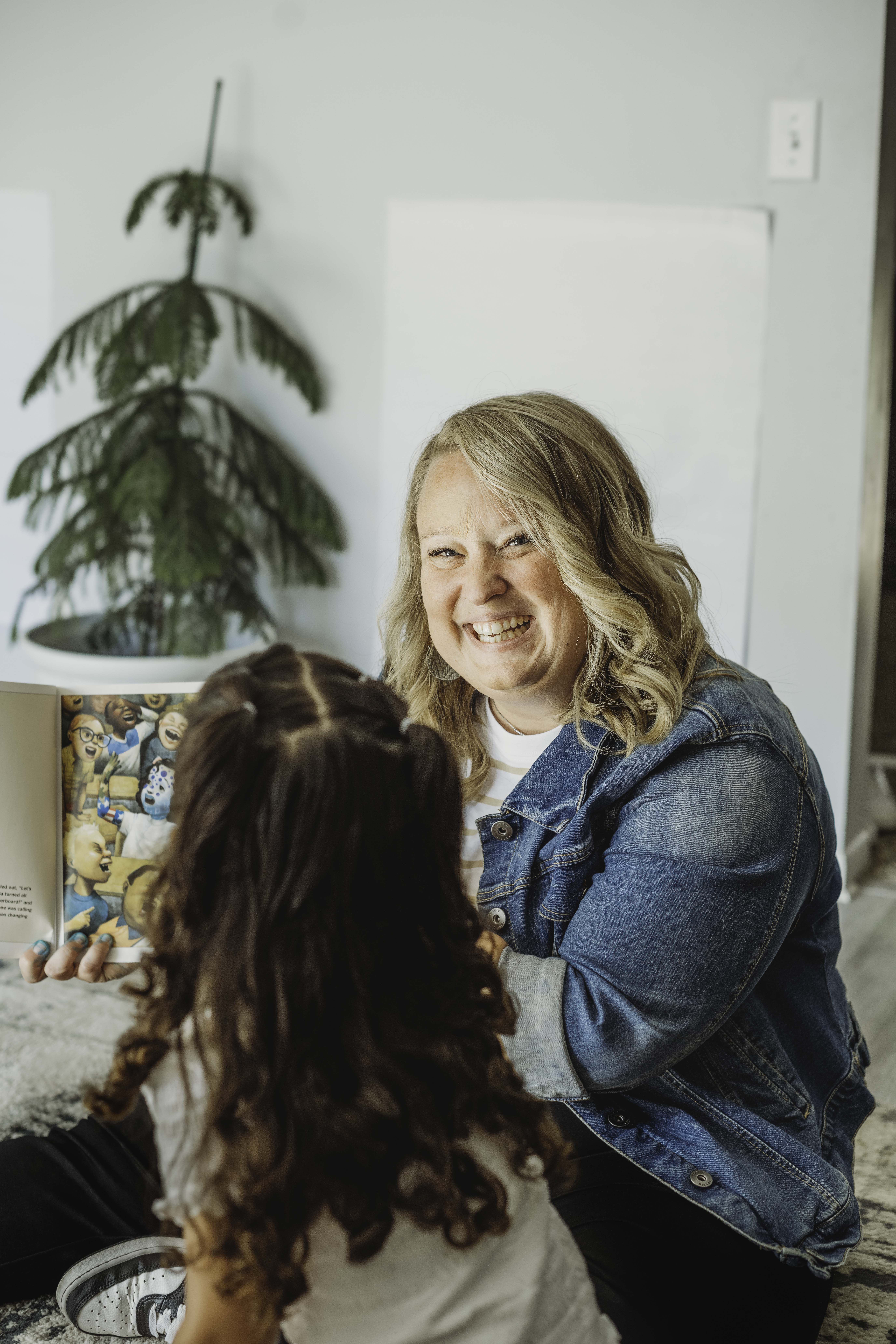 A teacher is showing a globe to a student