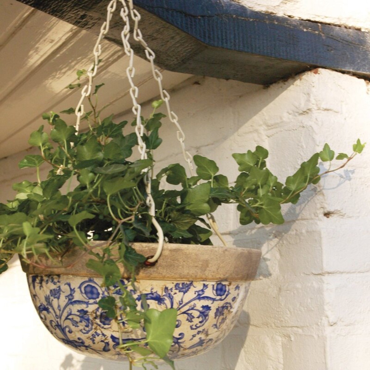 White and blue ceramic hanging planter