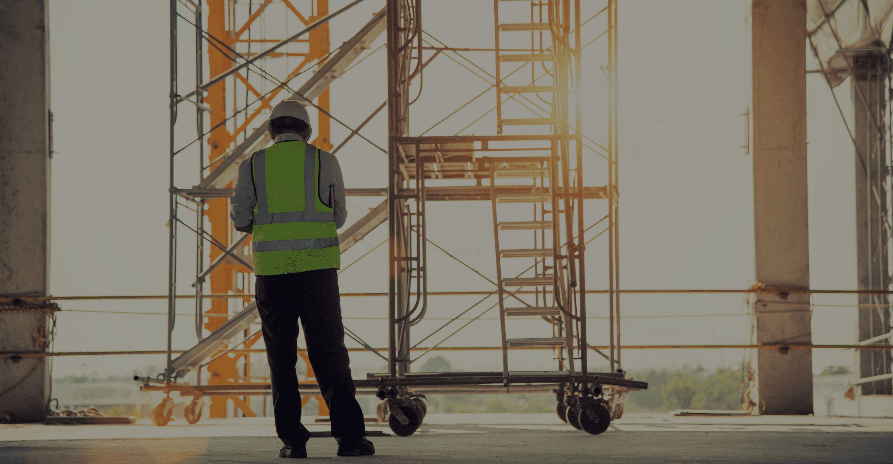 Worker standing in a construction site