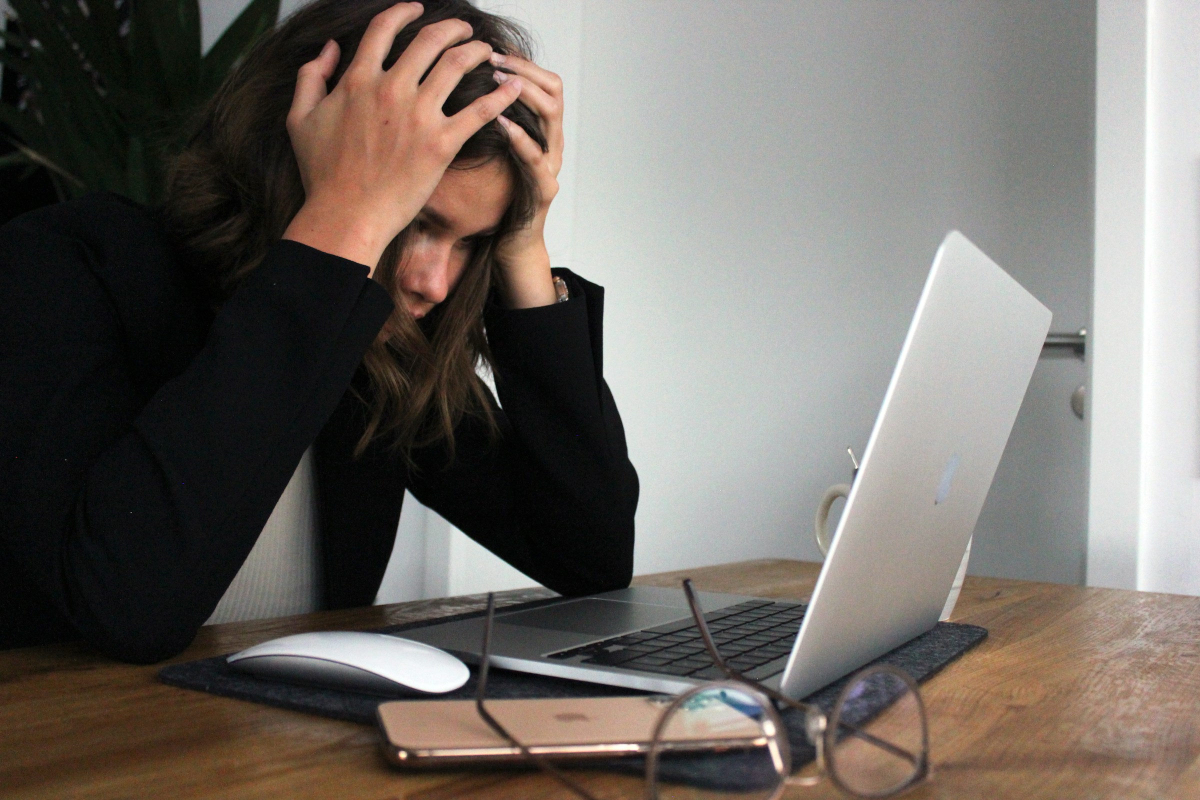 woman worried on laptop - Is It Hard To Go Viral On TikTok