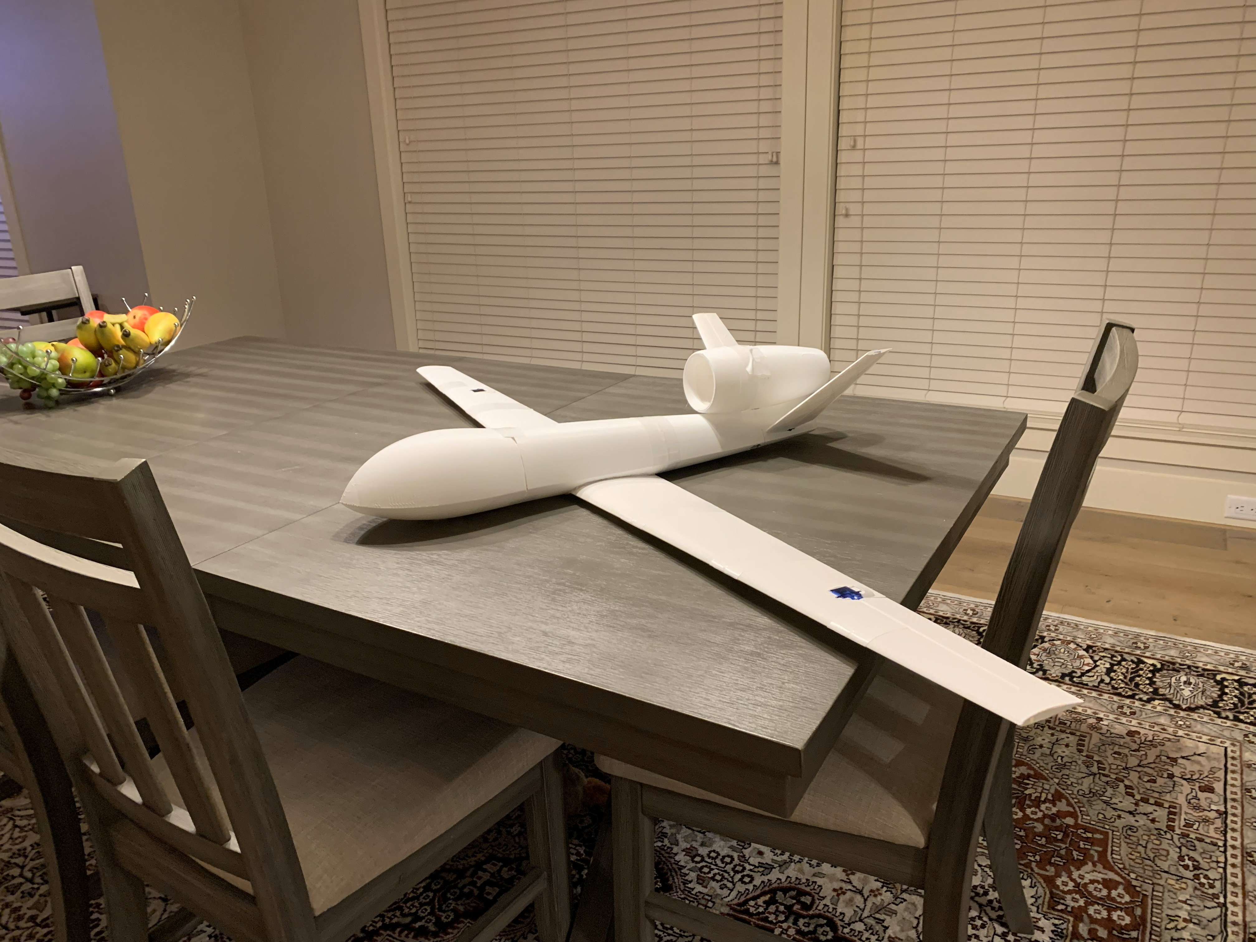 The BLZN-1 aircraft airframe fully assembled on a dining table (no electronics besides servos installed)