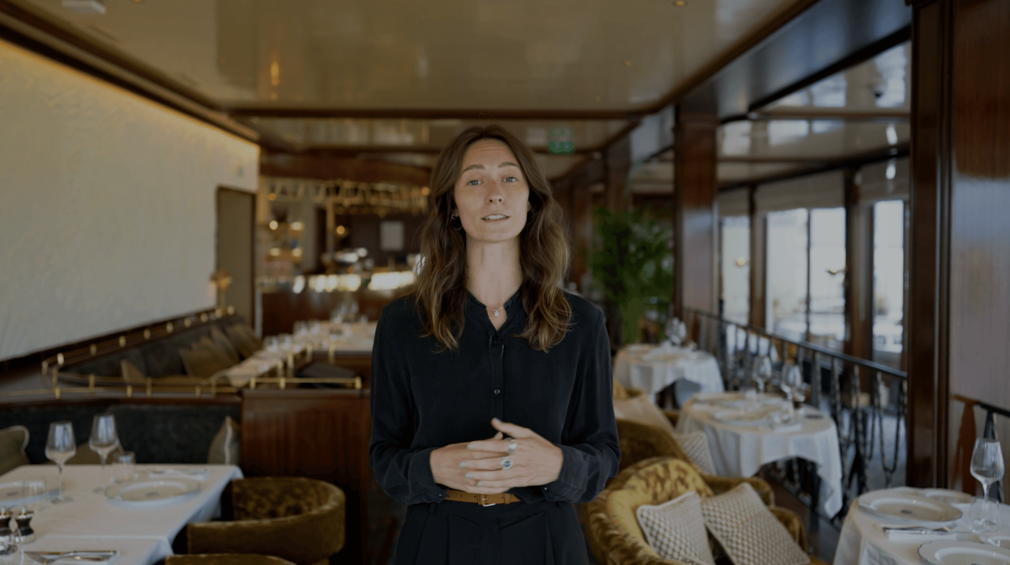 woman standing and teaching in a restaurant
