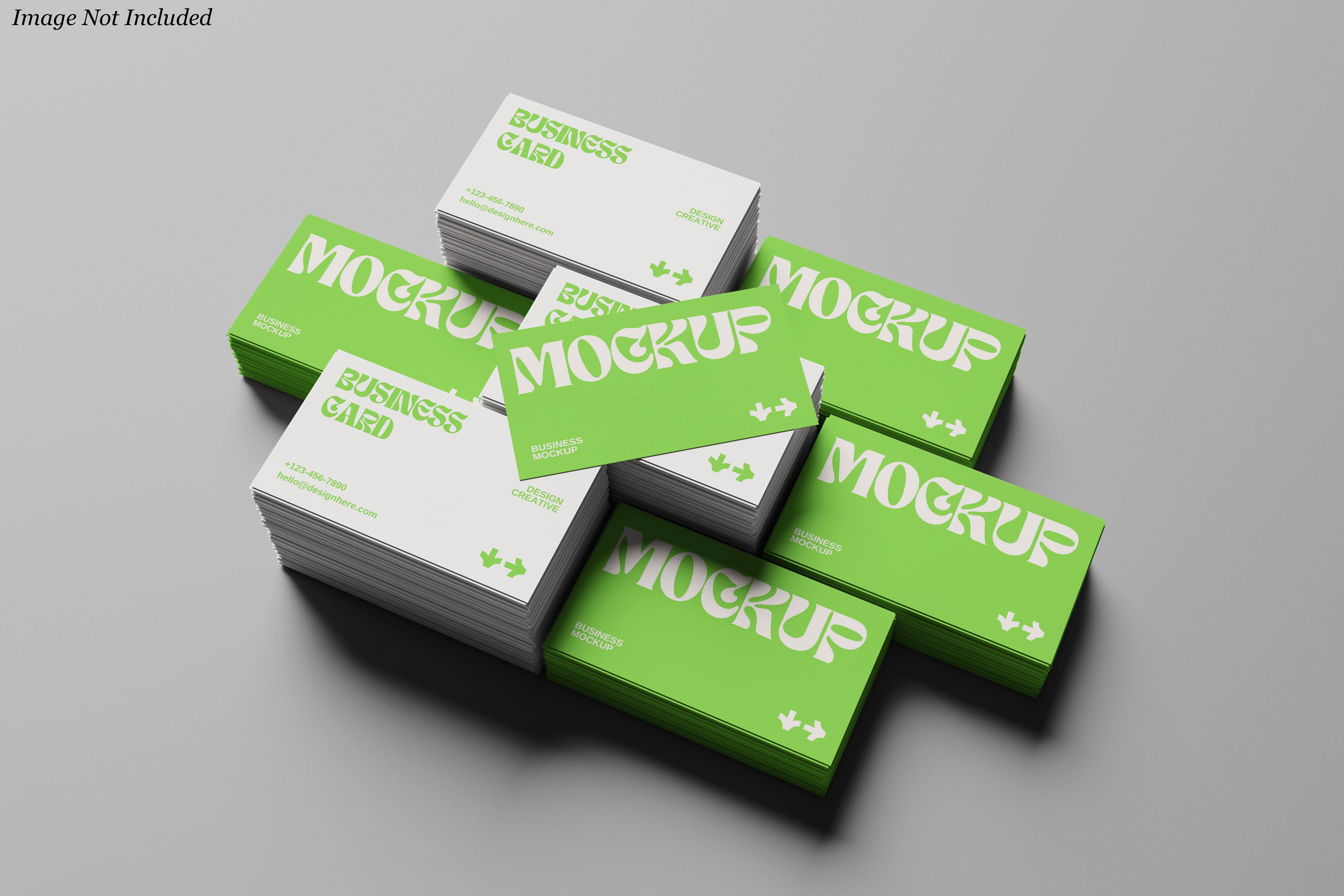 High-angle view of a pile of professional business cards; some cards are vibrant lime green with white bold typography, while others are minimalist white with green accents, featuring a realistic paper texture and soft shadows for brand identity presentation.