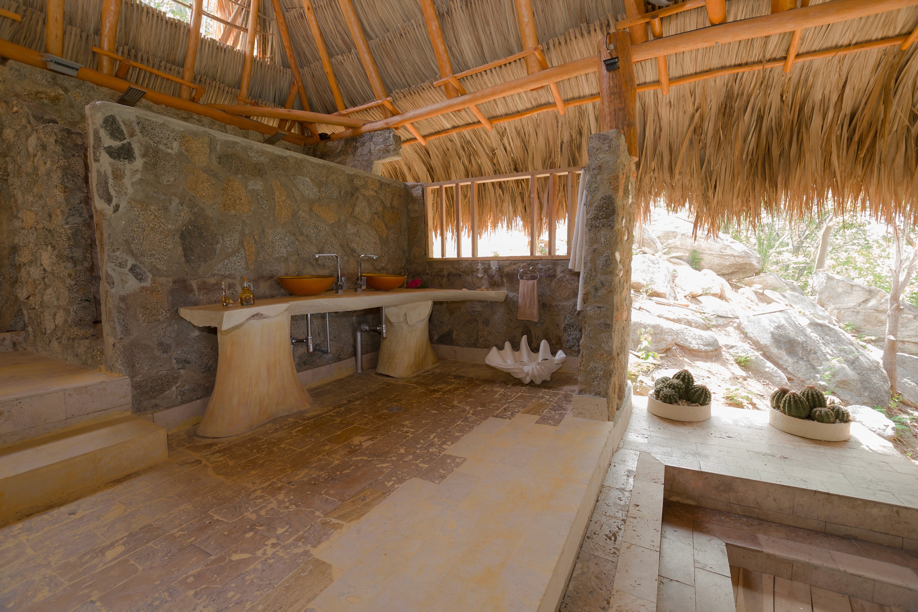 Meditation corner focus, showing soft floor cushions, low lighting, and sound machine.