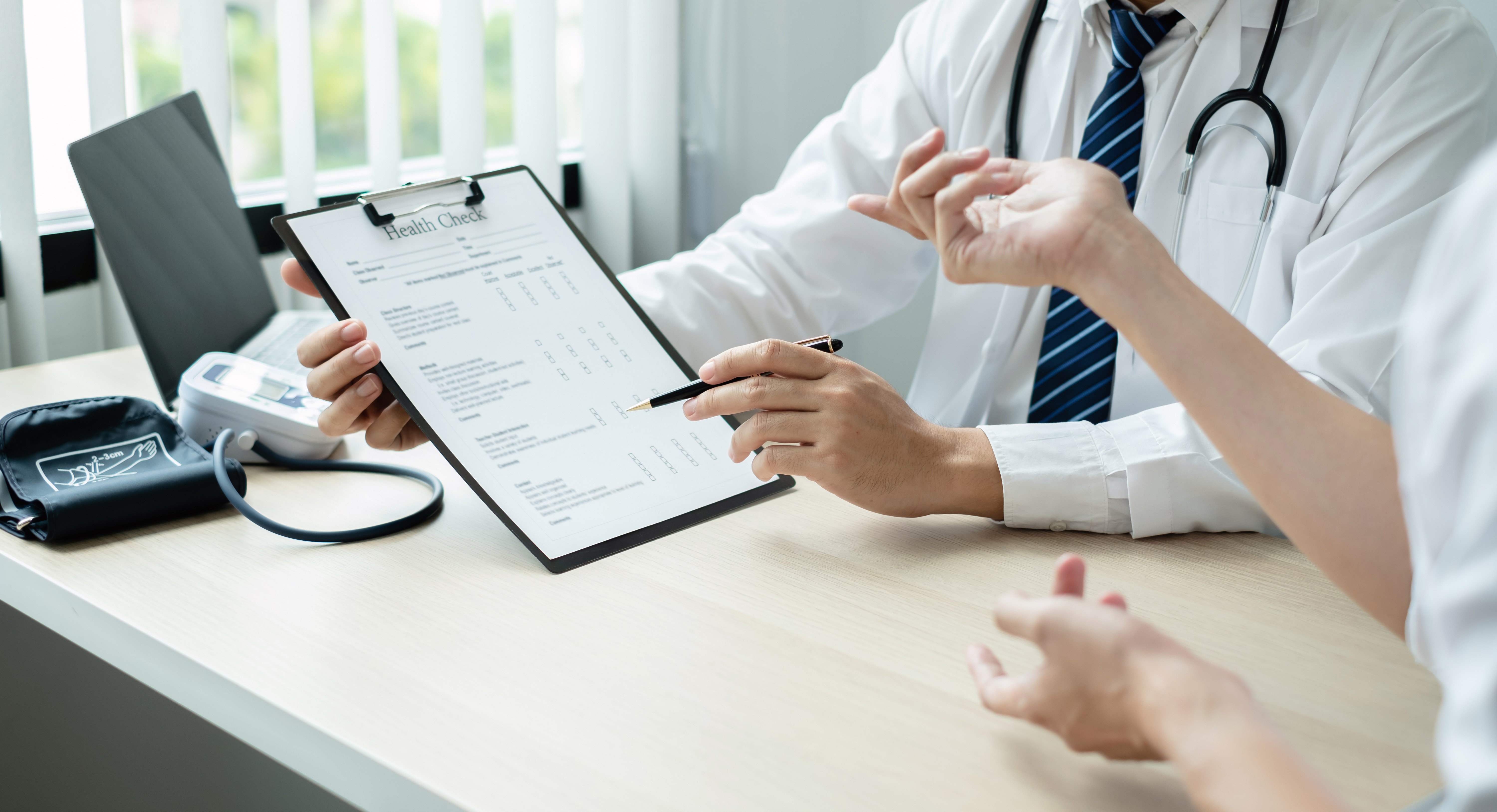Professional man in black shirt smiling