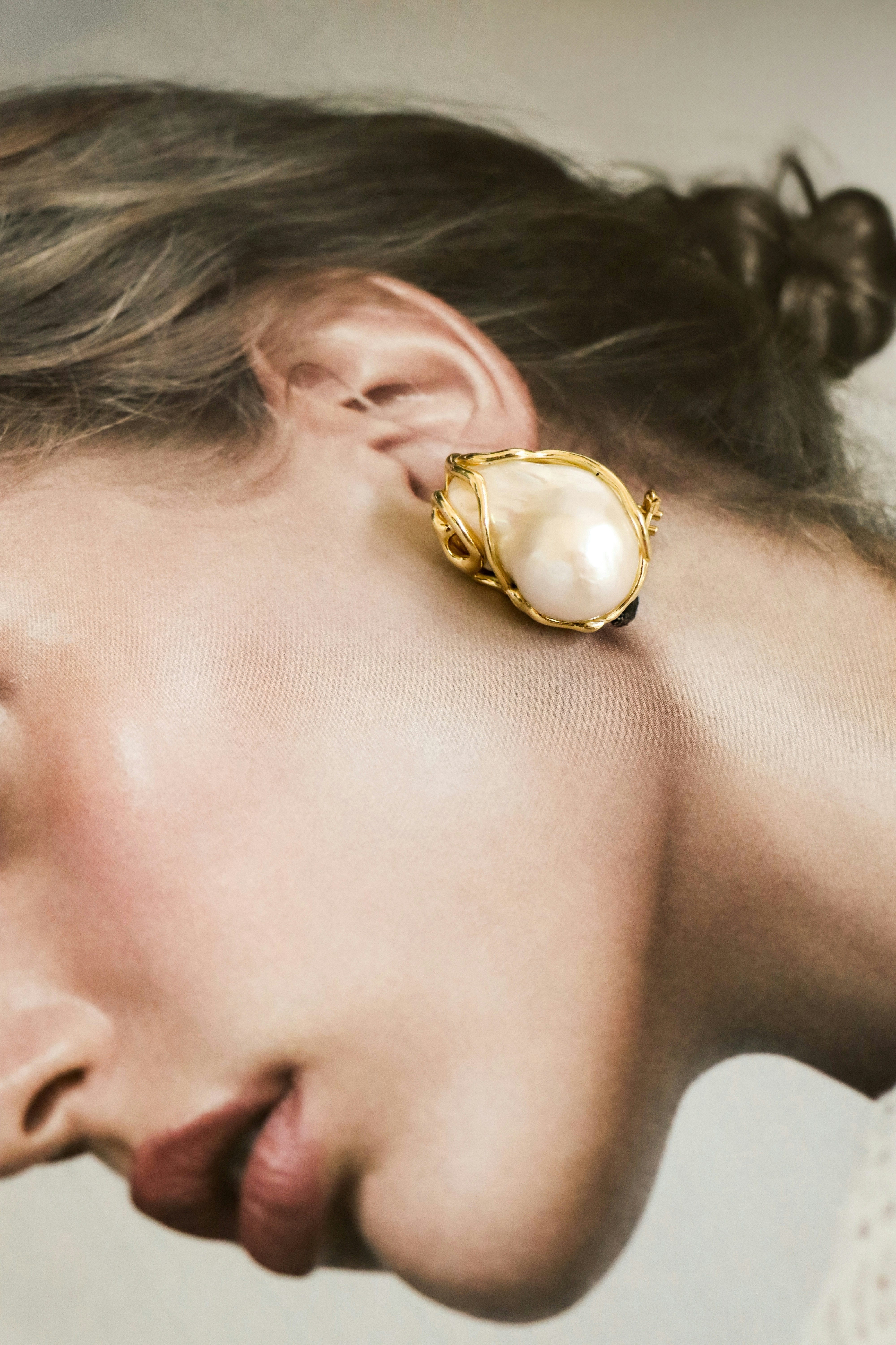 Photo by <a href="https://unsplash.com/@_giuss_?utm_source=unsplash&utm_medium=referral&utm_content=creditCopyText">Giustina Barison</a> on <a href="https://unsplash.com/photos/elegant-pearl-and-gold-earring-on-womans-ear-vfgCzz5PFs0?utm_source=unsplash&utm_medium=referral&utm_content=creditCopyText">Unsplash</a>