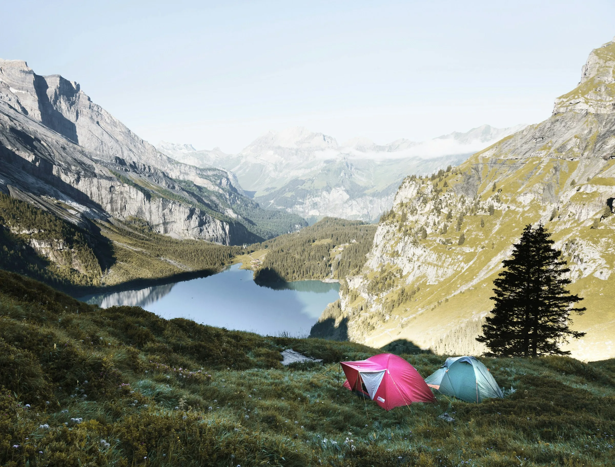 Tents beside a mountain lake