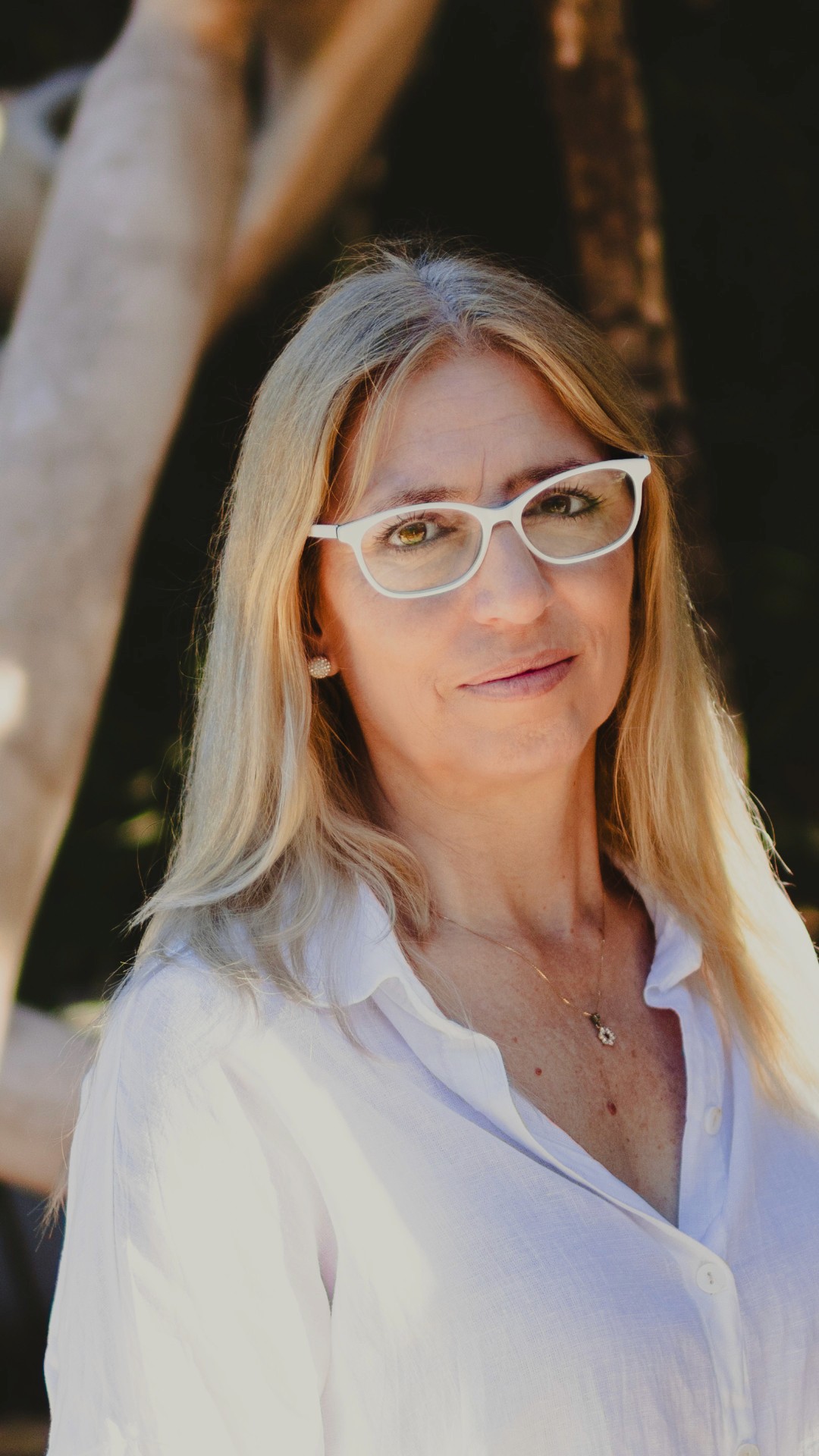 Man meditating in seated yoga pose with eyes closed