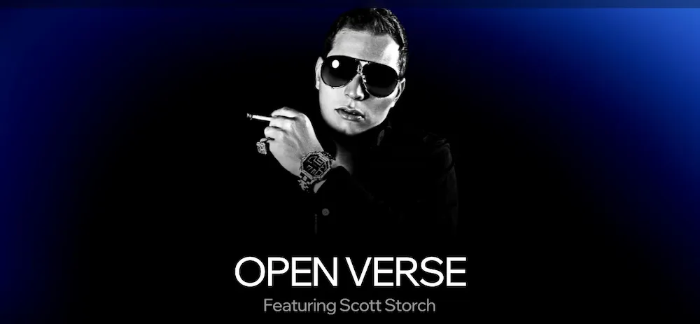 alt="kevin woo raising his arm and singing to his fans"