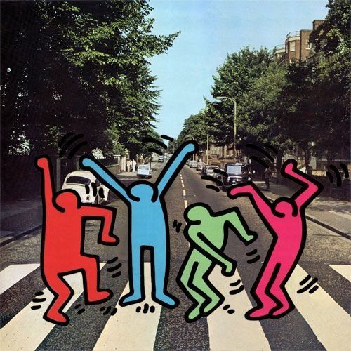 a laptop computer sitting on top of a white chair