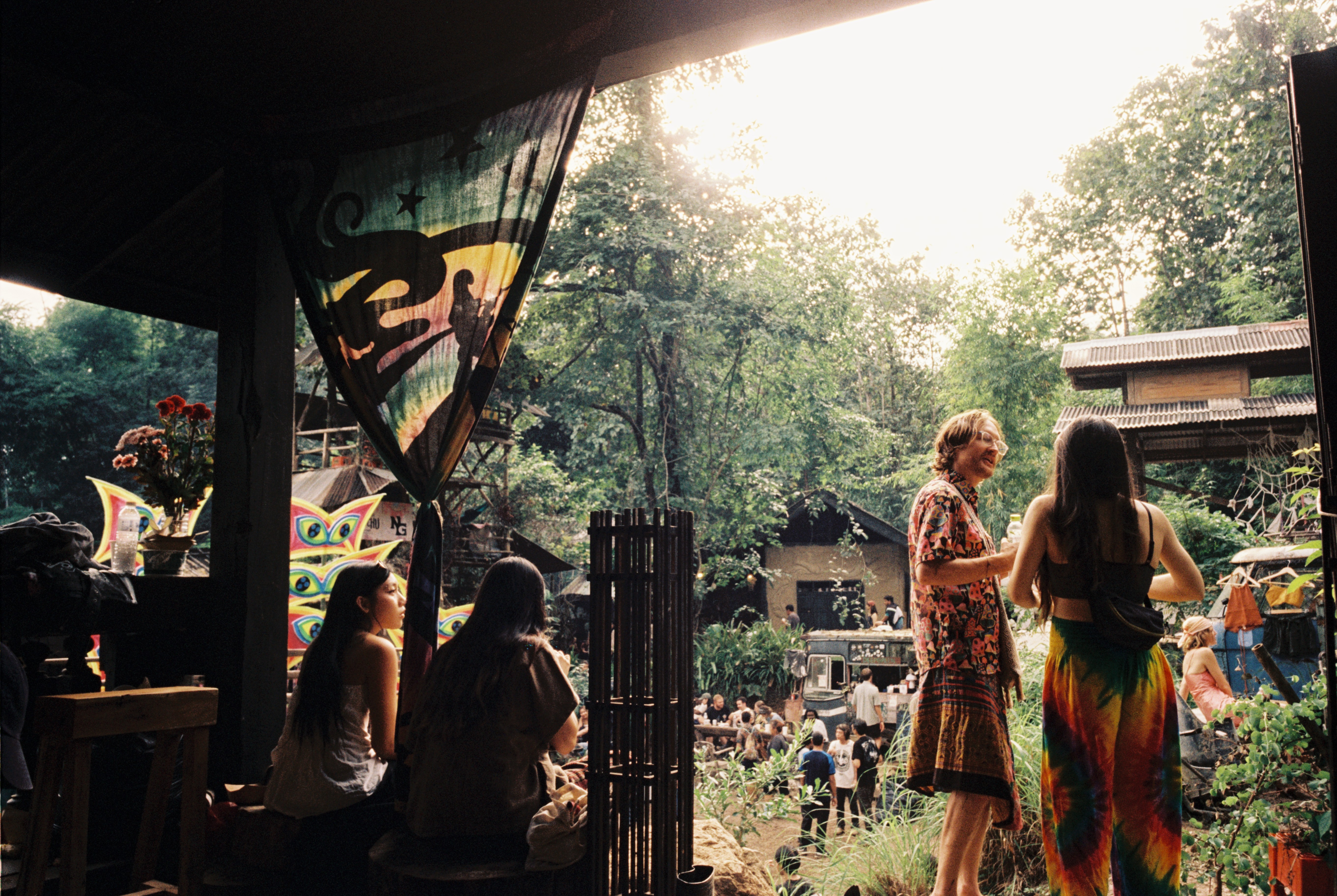 kids lying on a glass land and smiling