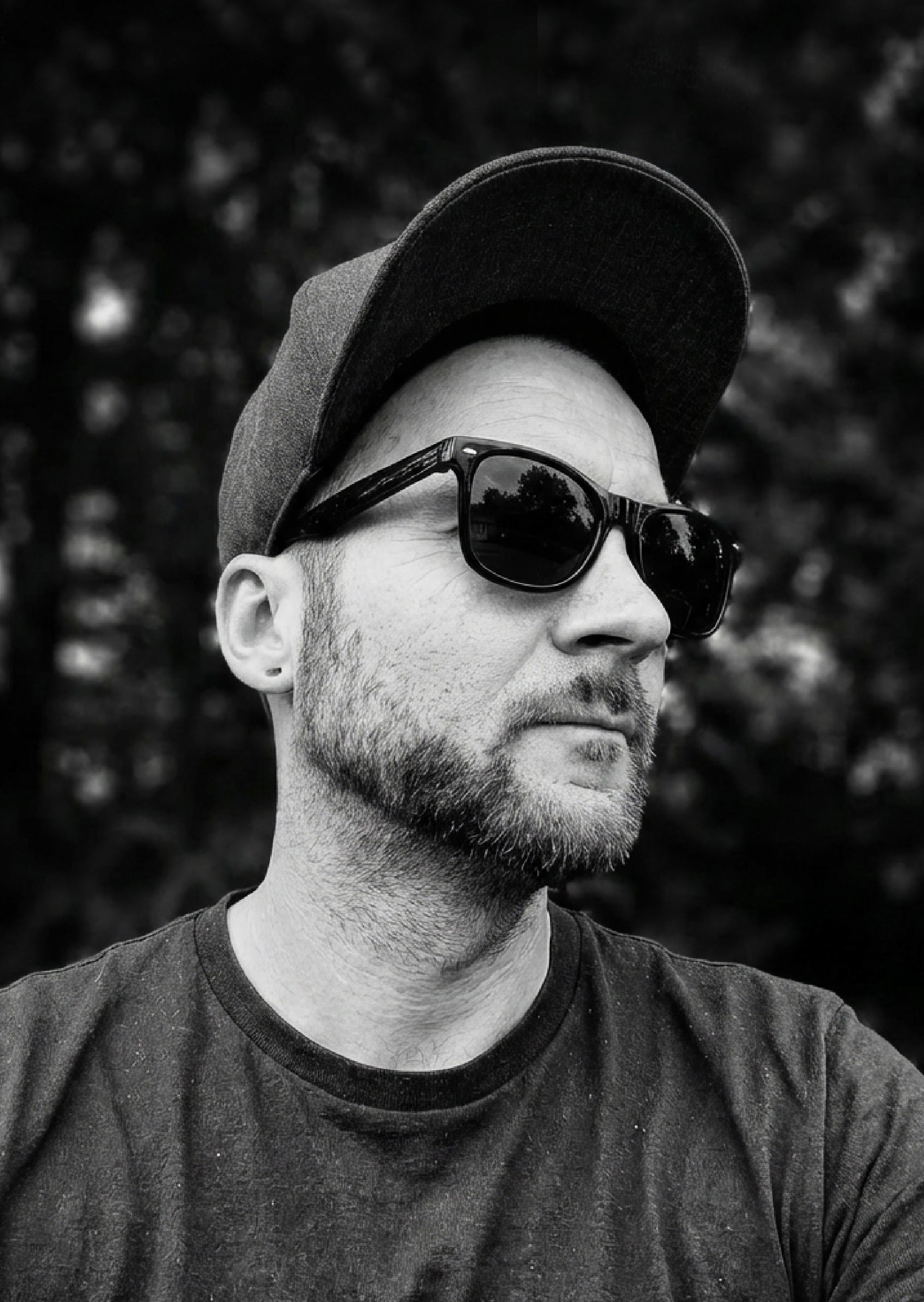 grayscale photo of woman in white and black stripe shirt