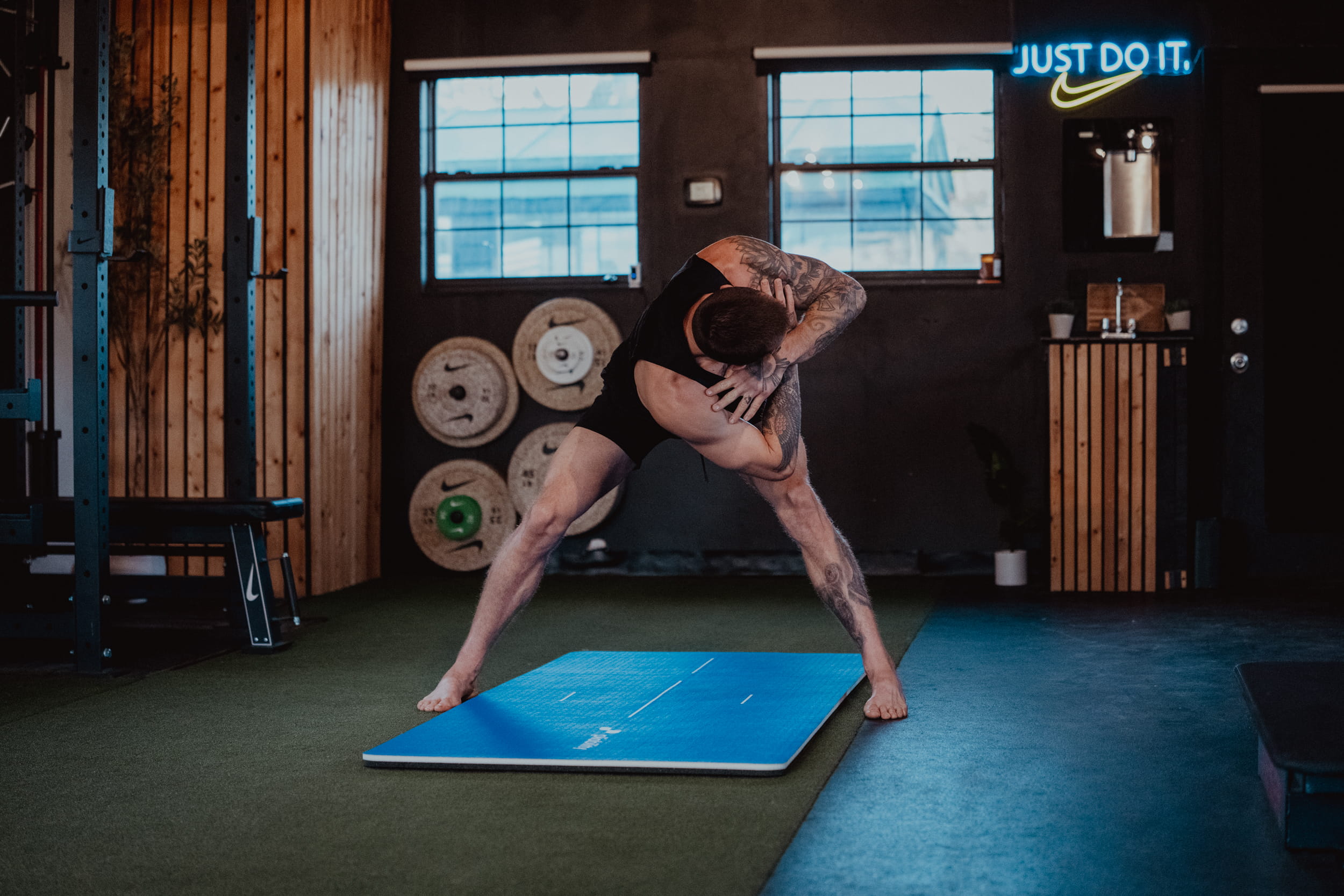 man interlocking arms - How to Relieve Morning Back Stiffness 