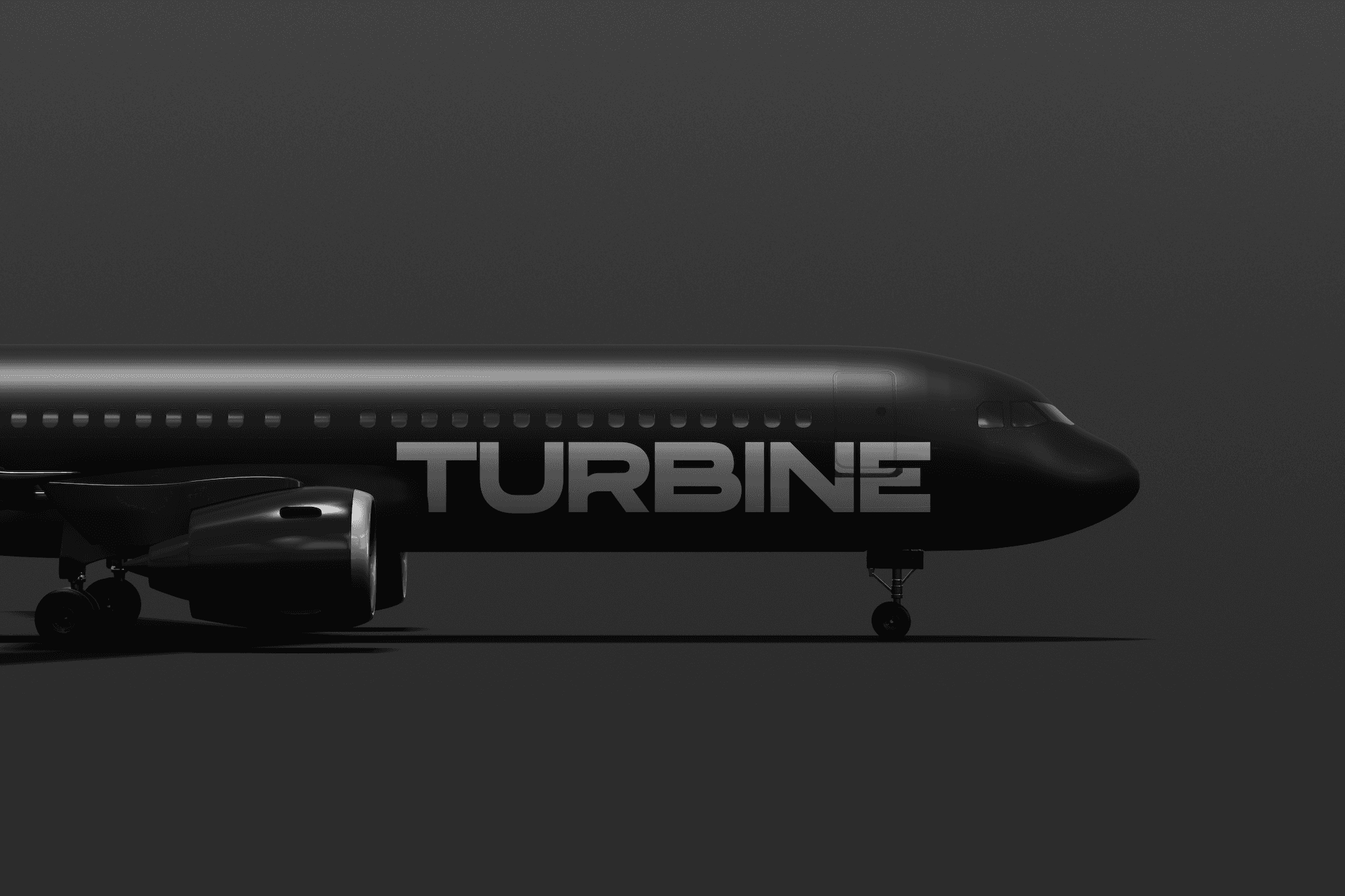 Abstract macro of a glass drop forming a black-and-white flower shape through light refraction on a soft gray background.