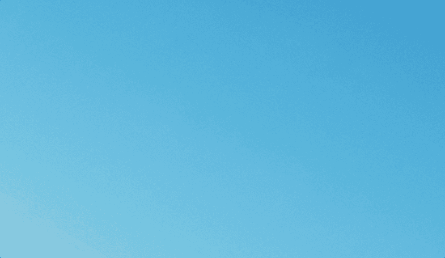 kids lying on a glass land and smiling