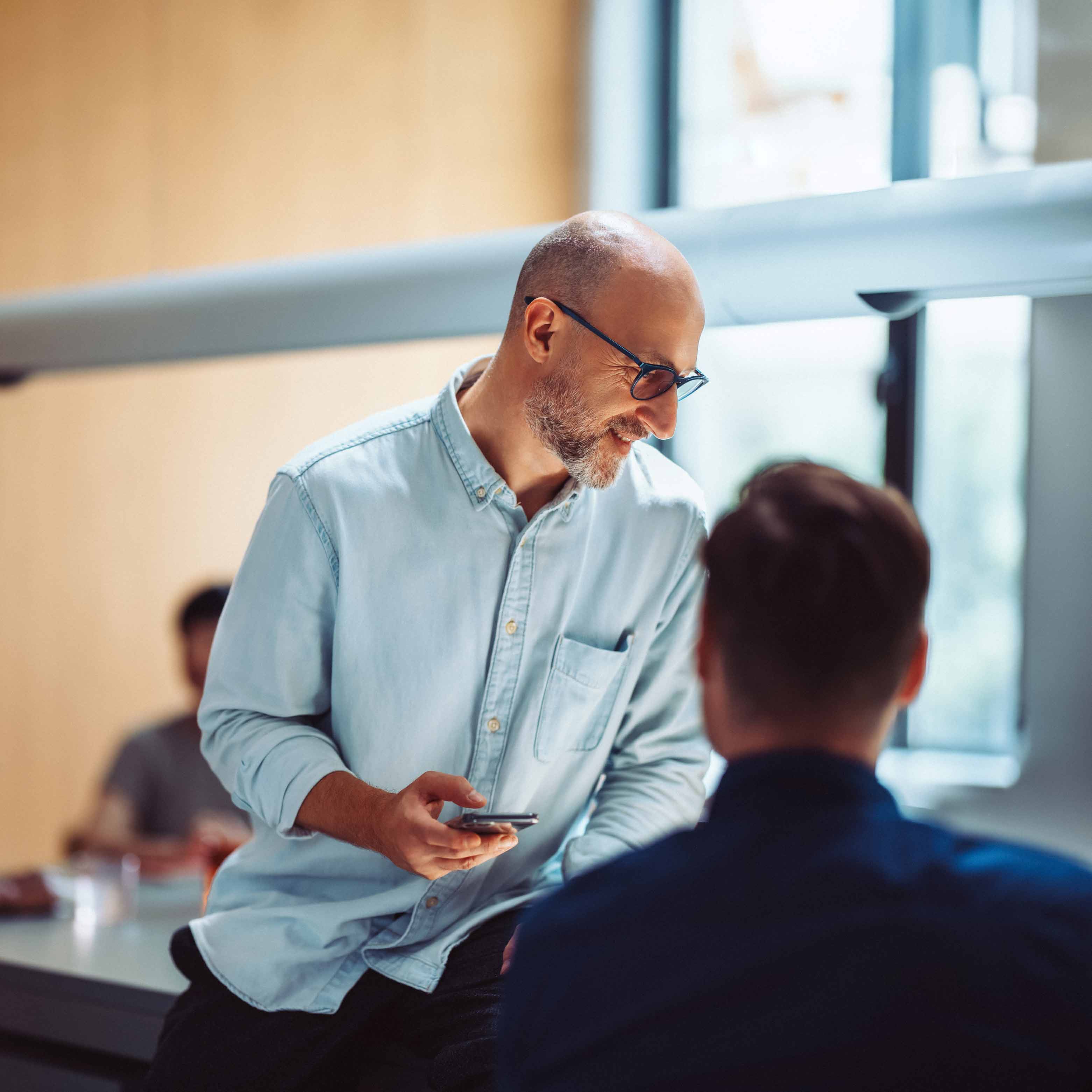 EB-1 visa lawyer in office consultation with clients